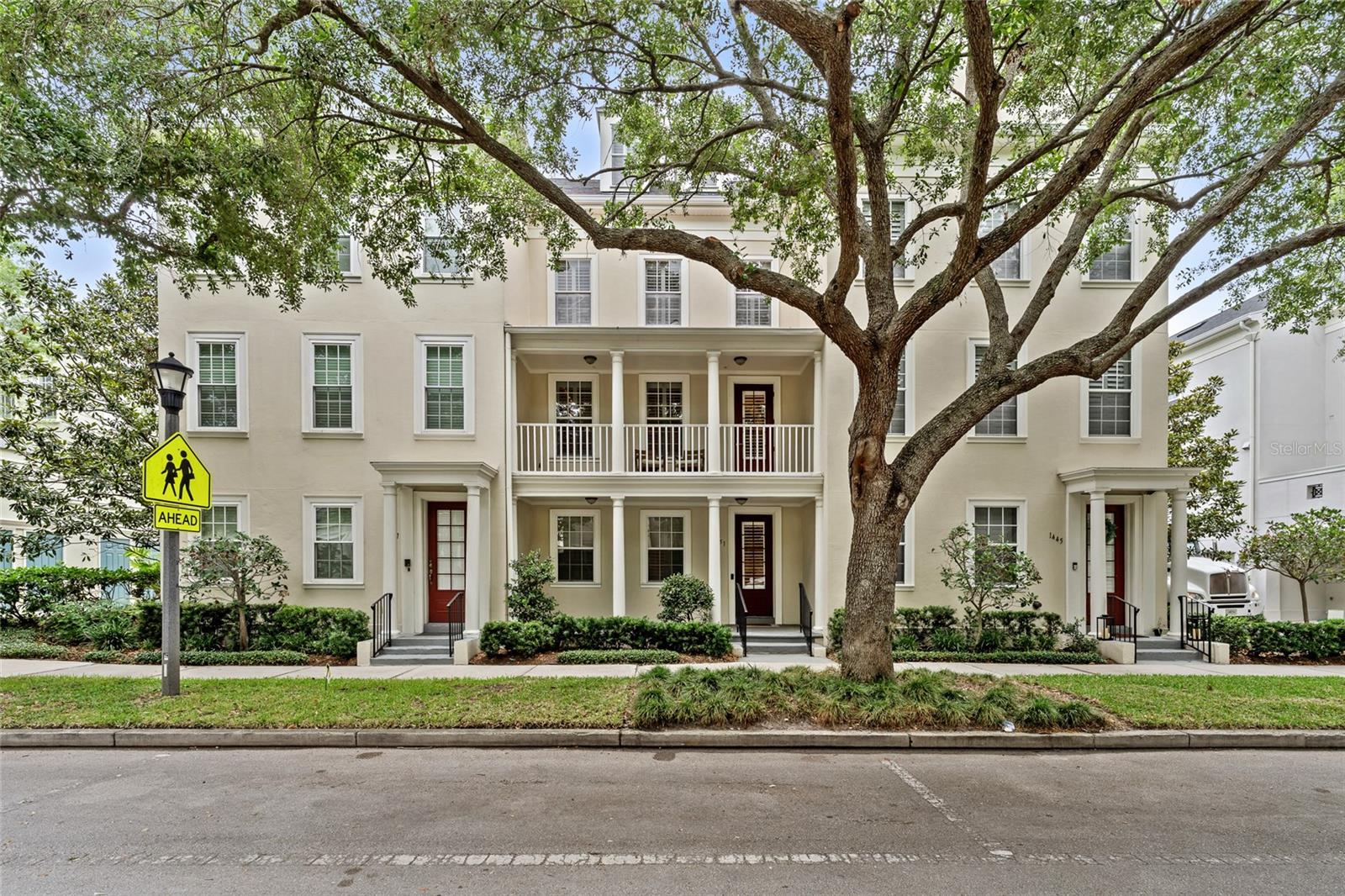 Experience refined living in this elegant, beautifully updated four-story townhome nestled within a lush courtyard in the highly sought-after community of Baldwin Park. Offering approximately 2,539 square feet of thoughtfully designed living space, this exceptional residence features three spacious bedrooms, each with its own private ensuite bath, plus a versatile fourth-floor loft/media room —ideal for a home office, entertainment space, or guest retreat. Designed for both comfort and sophistication, the home boasts rich hardwood floors, plantation shutters, crown molding, new LED recessed lighting, and stylish updated fixtures throughout. The heart of the home is a stunning remodeled kitchen featuring stainless steel appliances, a generous center island, breakfast bar seating, and seamless flow into the open-concept dining and living areas, creating the perfect setting for everyday living and entertaining.

One of the home's most exceptional features is its private rooftop retreat, offering a rare outdoor living experience that truly sets this residence apart. Accessible from the expansive fourth-floor loft, this elevated outdoor oasis provides the perfect setting for entertaining guests, hosting sunset dinners, enjoying weekend gatherings, or simply relaxing under the stars. With ample space for comfortable seating, outdoor dining, and personalized design touches, the rooftop terrace serves as an extension of the home's living space and creates an inviting atmosphere for year-round enjoyment. Whether savoring your morning coffee, taking in the evening skyline views, or celebrating special occasions with family and friends, this rooftop sanctuary delivers a lifestyle of luxury and relaxation.

Meticulously maintained and truly move-in ready, this residence offers peace of mind with major updates including a new HVAC system (2025), new roof (2025), and water heater (2026). A spacious two-car garage provides ample storage and convenience. Residents enjoy access to outstanding community amenities including a heated pool, fitness center, playgrounds, and expansive green spaces. Just moments from Baldwin Park Town Center, you'll enjoy walkable access to, Baldwin Elementary school, Publix, CVS, charming boutiques, and an array of popular restaurants and cafés. Outdoor enthusiasts will appreciate the nearby 2.5-mile scenic path surrounding Lake Baldwin, with direct access to a large dog park and the Cady Way Trail. Combining luxury, location, and lifestyle, this exceptional home offers a rare opportunity to enjoy executive living in one of Orlando's most desirable neighborhoods. Schedule your private showing today.