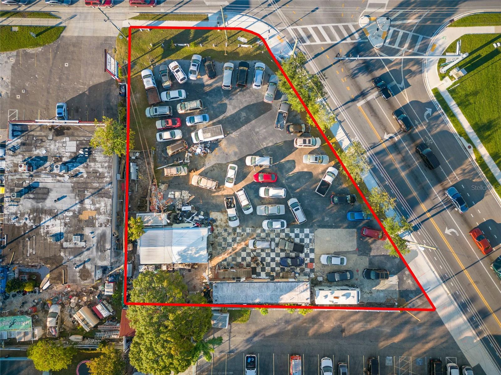 This is your chance to own an amazing corner lot with great visibility on the corner of Haines and 62nd.  Currently used as a car resale lot and fenced in with a garage/shed and mobile home used as an office, this property is full of potential.  High visibility with a corner lot and stop lights, turn your dream into a reality.