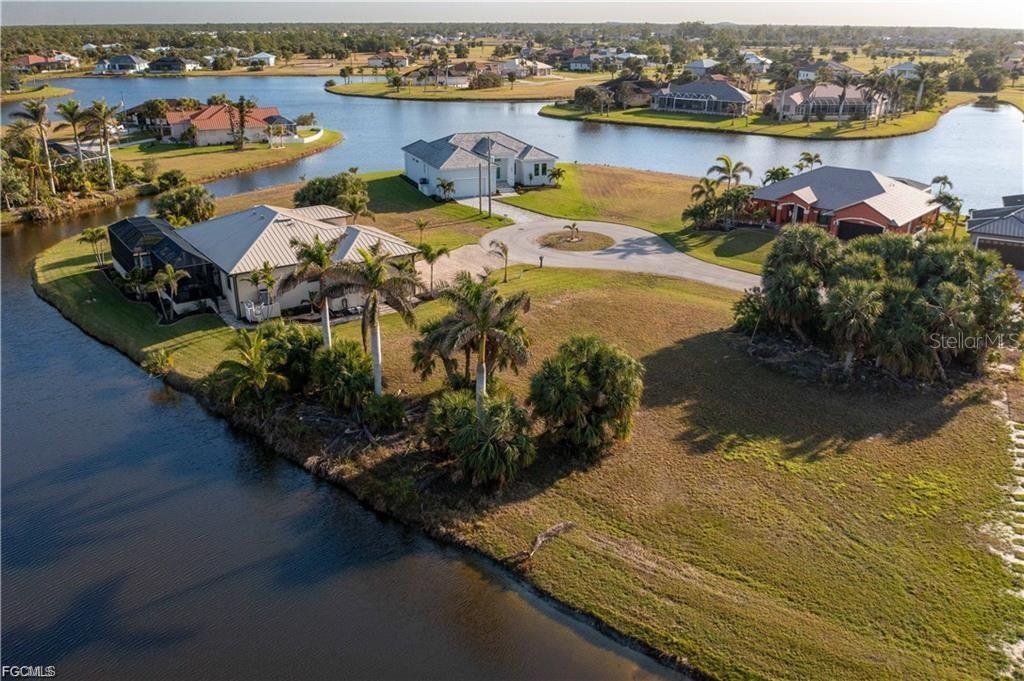Discover the perfect spot to build your custom home on Eagle Lake, the largest and most picturesque lake in Burnt Store Lakes. Enjoy expansive water views and a peaceful setting surrounded by newer homes in this well-maintained, deed-restricted community. This build-ready lot features public water and sewer, plus lake access for irrigation. Located near Burnt Store Marina, offering golf, boating, dining, and more. Just a short drive to Punta Gorda, Fisherman’s Village, and both Punta Gorda and Fort Myers airports. A rare opportunity to enjoy lakefront living in a vibrant Southwest Florida community.