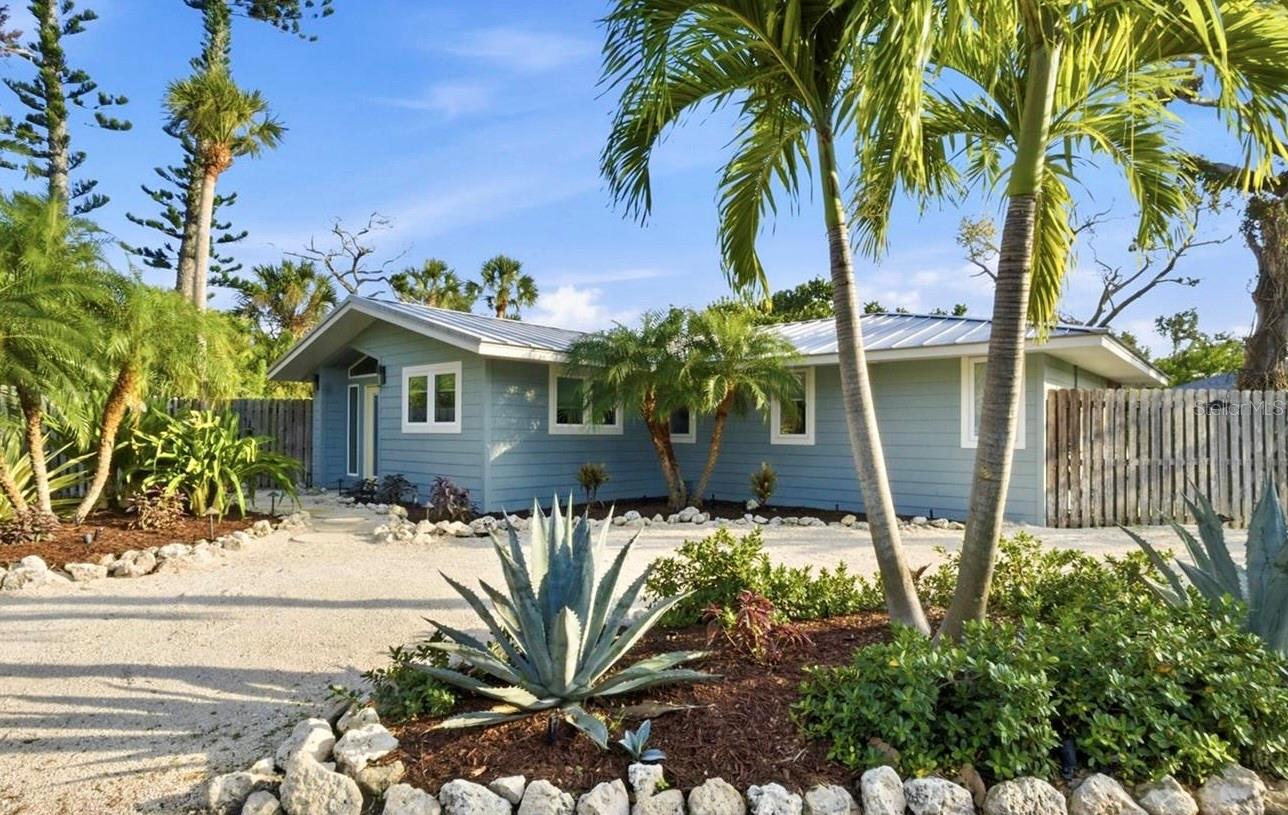 You’ve watched, you’ve waited, and now the moment to act is here. The seller is ready to pivot their investment strategy, and they’ve authorized a limited-time price adjustment on this property. Effective immediately, the price has been reduced to $700,000—but this offer is locked in only until next Friday. If this was the home you were waiting for, the hesitation ends today. Let’s get you into your new property before this window closes. The stunning Cali-Modern residence has a new, more attractive price! Presenting an amazing opportunity for this stunning, fully renovated residence where Cali-Modern design meets the tranquil elegance of Longboat Key. Presenting a stunning, fully renovated residence where Cali-Modern design meets the tranquil elegance of Longboat Key. This sophisticated, move-in ready home offers an abundance of good vibes and professional quality, available now on the highly sought-after North End of exclusive Longboat Key. Sleek, chic, and absolutely move-in ready, this property is an instant atmosphere setter. From the moment you step inside, you'll feel the coastal modern bliss. Enjoy the clean, modern lines, vaulted ceilings, and stunning stone tile floors, all bathed in gorgeous southern sun light. The upgraded kitchen and bathrooms sparkle with new features, complemented by new appliances. This home has been lovingly and extensively renovated, offering quality and style that goes well beyond the expected. You will find thoughtful design and premium features in every corner. Step outside to your own private backyard oasis, the perfect spot to sip a sunset cocktail. Fully fenced and private this oasis sets up perfectly for the future pool. And talk about location! You are literally steps from both Gulf and Bay access. This home boasts unbeatable walkability to island favorites like Harry's Deli and The Continental Kitchen, Euphymya Haye and the Hayloft, Lo-Key Island Grille, Cedars East Tennis and Fitness Resort and many others. The best-kept secret? A private back gate leads you directly into the 32 acres of Joan Durante Park, offering pure, natural Florida coastal hammock. This park is a true gem filled with nature walking trails, fishing piers, playground for the kids and multiple Bay access points (perfect for the kayak launch) No fuss, no stress. With a standing seam metal roof, Hardi board siding, newer double-pane windows, New interior, new appliances and offered fully furnished, this charmer is ready for your island life to begin immediately. Don't wait, come feel the charm for yourself!