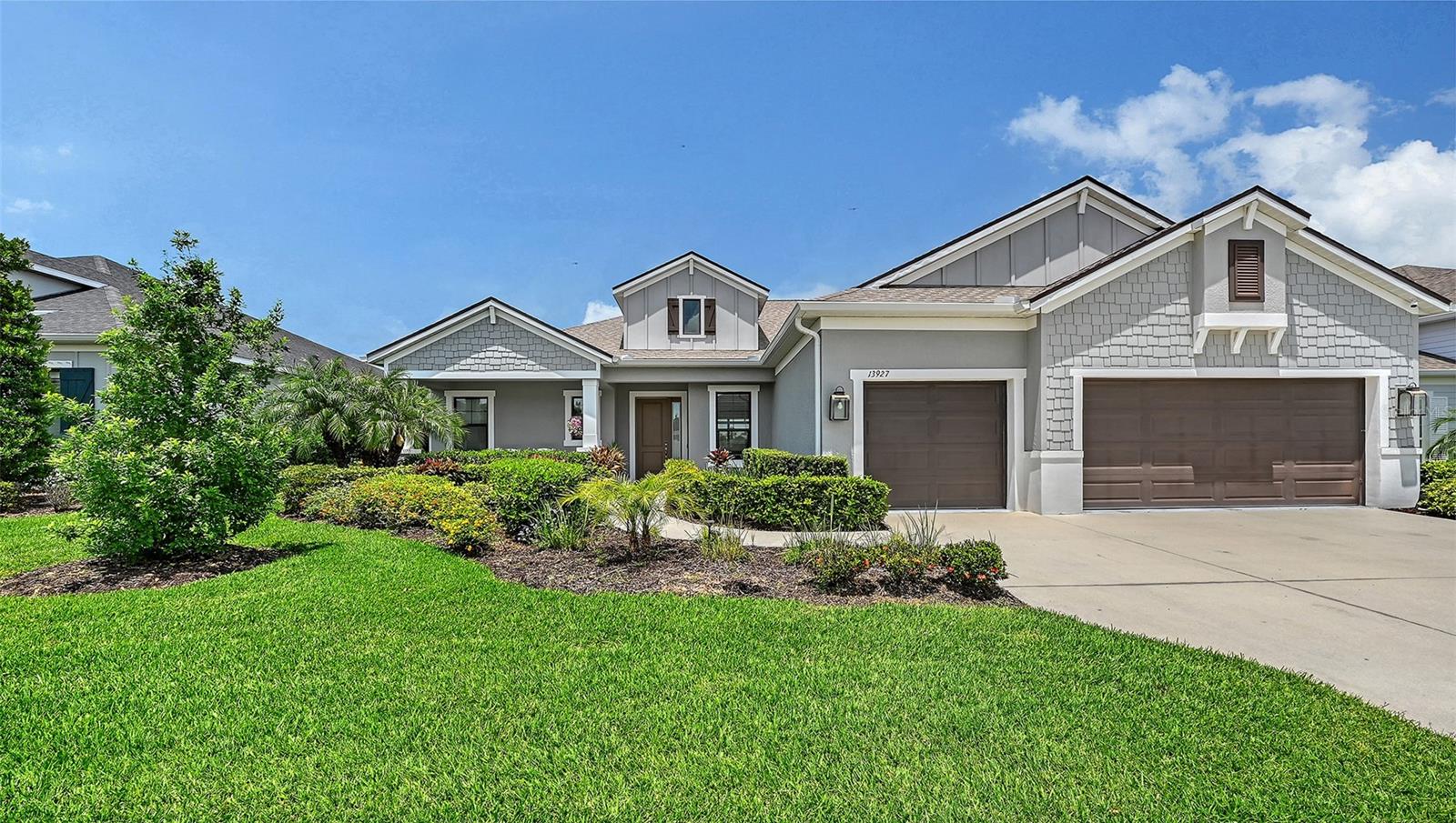 STOP SCROLLING! This is THE one! NEW ROOF, POOL, OUTDOOR KITCHEN, WHOLE HOUSE GENERATOR, IMPACT WINDOWS, NO CDD, AND MORE! This beautifully appointed Neal Communities Sanibel boasts 3 bedrooms + an oversized office/den, 3 full bathrooms, and a 3-car garage in the highly sought-after gated community of Canoe Creek in booming Parrish! Built in 2019 and offering over 2,500 sq ft of thoughtfully designed living space, this home truly has it all. Step inside to discover soaring ceilings, crown molding, tray ceilings, smart home features, an open-concept layout, and stylish finishes throughout. The chef’s kitchen is a showstopper featuring an adjacent breakfast nook, oversized island, built-in oven, cooktop, walk-in pantry, and an abundance of cabinet space perfect for entertaining or everyday living. The spacious primary suite offers a spa-like en-suite bathroom with dual vanities and walk-in closets, while the split floorplan provides privacy and comfort for guests and family alike. Step outside to your own private backyard oasis featuring a panoramic screen enclosure, heated saltwater pool, outdoor kitchen, lush tropical landscaping, and peaceful outdoor living spaces designed for year-round Florida enjoyment. Additional upgrades include impact windows, whole-house generator, water softener system, decorative electric fireplace, smart thermostat, security system, electric blinds, overhead garage storage system, and so much more! Located in the rapidly growing Parrish area, Canoe Creek offers resort-style amenities including a clubhouse, 24-hour fitness center, heated community pool, spa, two dog parks, pickelball courts, a fire pit, scenic walking trails, golf cart-friendly streets, an on-site HOA manager, and a dedicated Lifestyle Coordinator helping create an active and social neighborhood atmosphere. Enjoy LOW HOA fees and NO CDD fees, all while being just minutes from new shopping, dining, parks, the Manatee River, and convenient access to I-75. This central location between Tampa and Sarasota perfectly combines luxury living with everyday convenience in one of Southwest Florida’s fastest-growing communities!