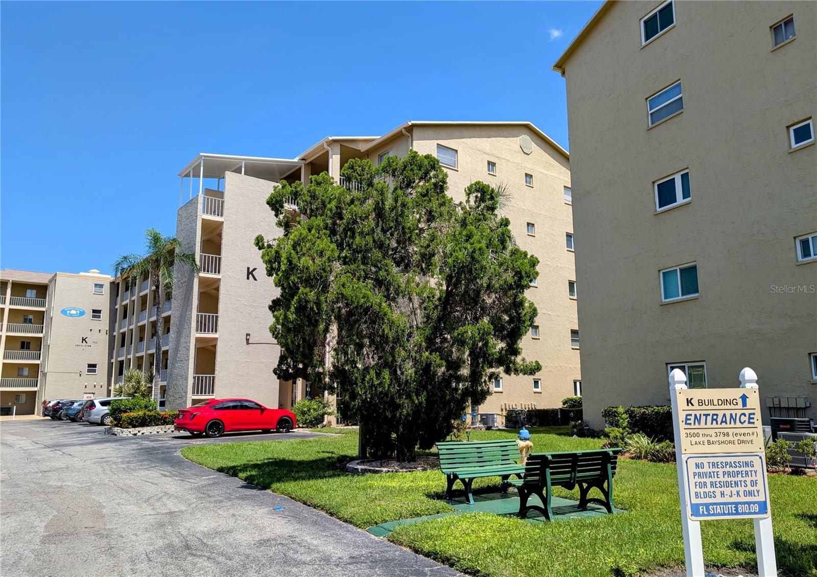 Super Appealing Price Reduction! This charming Turnkey 1BR/1BA is Competitively priced. You'll appreciate the move-in-ready cutie located on the 3rd floor of K-bldg. Serene vinyl & screened lanai is perfect for relaxing and take in peaceful treetop views.  Inside, enjoy the bright and inviting space with tasteful furnishings, a new AC system (2023), brand new water heater (3/2026) & three ceiling fans for year-round comfort. The spacious bedroom features two beds, one a newer king-size TempurPedic bed to ensure restful nights.  Conveniently located, with elevators and stairs at either of bldg and easy access to multiple coin laundry facilities on both 2nd and 4th floors. The community is packed with amenities! Take a dip in the beautiful lakeside heated pool, join in clubhouse activities, play a game of shuffleboard, or grill out at the gas BBQ area. Love the outdoors? The fishing pier and lakeside gliders provide a perfect spot to unwind and soak in the beauty of the water. All of this at a GREAT price! Close to shopping, dining, entertainment, and within 10 miles of spectacular Gulf beaches on Anna Maria Island. This turnkey condo is ready for you to enjoy. Just bring your toothbrush and start living the Florida lifestyle!