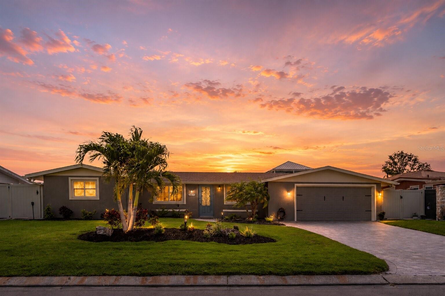 BRING YOUR BOAT—Turnkey waterfront investment opportunity ideally suited for rental income or a coastal vacation retreat, located just minutes from the pristine beaches of Anna Maria Island. This completely remodeled 3-bedroom, 3-bath residence sits directly on the water and features hurricane-proof windows and doors for ultimate peace of mind. 
The interior has been thoughtfully updated with granite countertops, modern finishes, and durable upgraded tile flooring throughout, while the air conditioning unit was newly installed just 2 years ago. A reinforced seawall and private dock enhance both value and long-term stability. Designed for the Florida boating lifestyle, the property features direct canal access and a convenient boat and kayak lift—perfect for effortless days exploring the water right from your backyard. 
Outdoor living is elevated by a private pool, creating the perfect space to unwind after a day of boating or paddleboarding. Sold fully furnished and move-in ready.