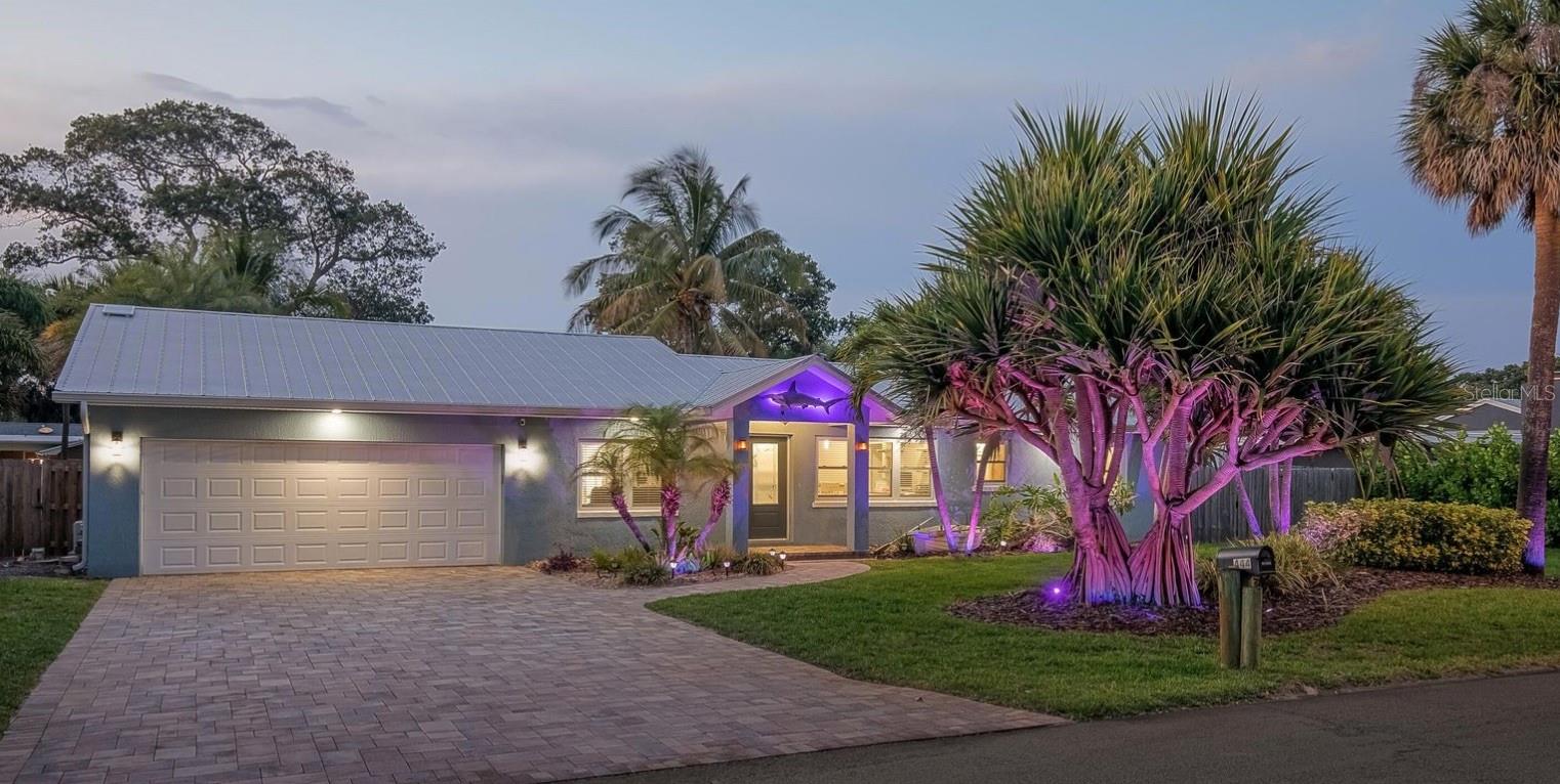 Outdoor lovers dream! This beautifully updated home sits on an oversized lot with mature landscaping, comes with an oversized pass-thru garage, a fabulous backyard with a pool, tiki bar, koi pond and coffee deck - it is a home made for outdoor entertaining. Inside you will find an open living space with a double-tray ceiling, and a fully upgraded kitchen and dining area that look out to the backyard through your sliding glass door. The primary bedroom also looks into the backyard, has an oversized shower, walk-in closet, dual sinks and toilet room. 2011 Metal Roof, 2015 HVAC, 2018 vinyl double pane argon windows and doors, 2022 new sprinkler system throughout entire yard, 2022 water heater, and 2022 fully insulated the house.

The oversized garage has a split AC unit. There is an unfinished shed in the backyard that can be used as a she-shed or a workshop, it is hurricane rated.
All plumbing has been replaced with PVC and a has a new 320' well.
This home is in a great area, a few blocks from the 192 causeway, four blocks to the beach, 1 block to the river, surrounded by great neighbors and in a wonderful school zone. You can ride your bike or take your golf cart, to the grocery store, school, restaurants, the boardwalk and so much more. We look forward to welcoming you home. ;Water: City
