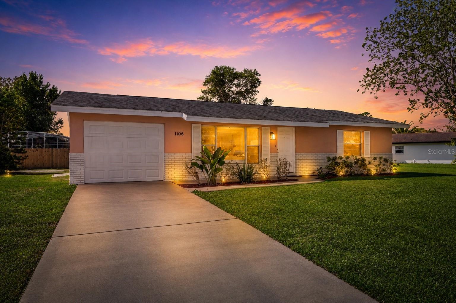Virtually Staged. Welcome to 1106 Blueberry Drive in the established Willow Run community of Port Orange, Florida. This well-maintained concrete block home offers 2 bedrooms, 1.5 bathrooms, a 1-car garage, and 1,064 square feet of comfortable living space on an oversized 122' x 100' lot, providing plenty of room to enjoy the outdoors.

Inside, you'll find a bright, open layout with spacious living areas, low-maintenance flooring throughout, and an abundance of natural light. The kitchen features ample cabinetry, generous countertop space, stainless steel appliances, and a functional design that opens to the dining area, making everyday living and entertaining easy.

Both bedrooms are generously sized with excellent closet space, while the full bath and convenient half bath provide added functionality. The attached garage includes laundry and additional storage.

Seller offers a $10,000 roof credit at closing to help make this home an affordable option with homeowners insurance.

This move-in-ready home is one you won't want to miss.