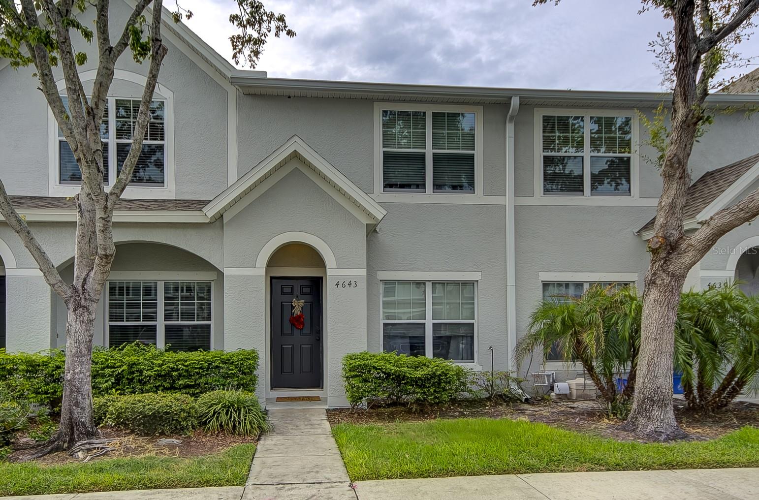 Welcome to this beautifully maintained two-story townhouse with 2 bedrooms and 2.5 bathrooms located in the desirable Sawgrass Village community, right in the heart of Pinellas County! As you walk into this inviting home, you'll be greeted by a large open floor plan and ceramic tile throughout the living room, kitchen, and bathrooms, plus a brand-new refrigerator, washer and dryer for added convenience. Relax on the screened-in back porch overlooking a peaceful pond, offering the perfect space to enjoy your morning coffee or unwind after a long day.

The HOA provides exceptional value by covering lawn maintenance, exterior maintenance, trash service, and recently completing a new roof and fresh exterior paint, giving you peace of mind and low-maintenance living. Sawgrass Village residents also enjoy access to a community clubhouse, swimming pool, and dedicated dog park.

This property is perfectly located near all major roadways; you're only minutes from award-winning beaches, hospitals, shopping centers, restaurants, and a movie theater. Being close to I-275, you will have easy access to both the St. Pete/Clearwater airport and the Tampa International airport. With your new home in a prime spot in the middle of Pinellas County, you'll have your choice of a quick drive to both downtown St. Petersburg and downtown Clearwater, along with all of the beautiful towns close by. This home offers both comfort and convenience for all of your needs. The property includes one assigned parking space plus ample guest parking for family and friends. Don't miss this fantastic opportunity to own a move-in-ready home in a perfect Pinellas County location!