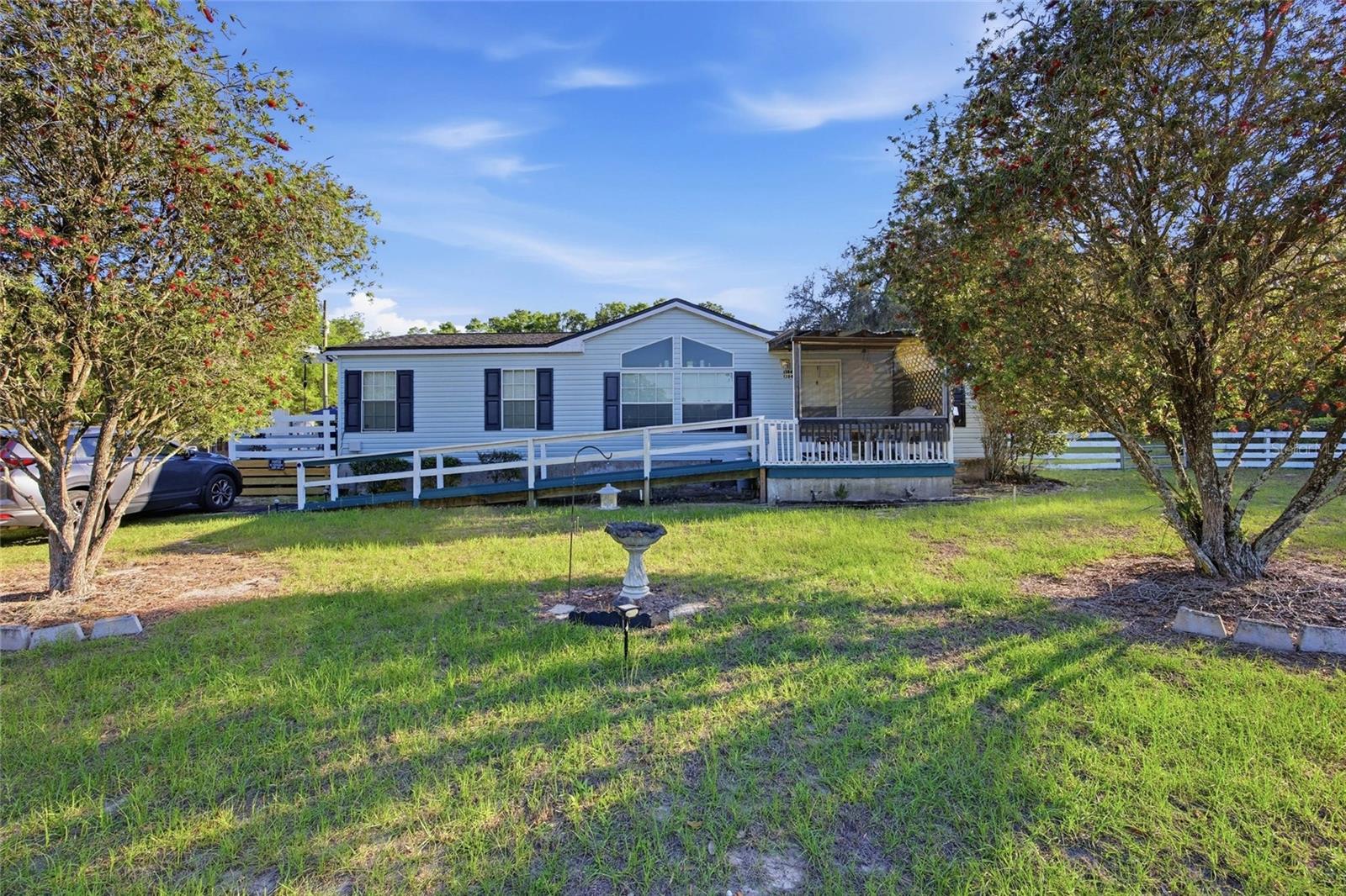 Set on 5.16 beautiful acres in Citra, this 3 bedroom, 2 bath modular home offers space, privacy, and plenty of potential. Built in 1995, the home is ready for a great opportunity for a buyer looking to add their own touches and create value. The property includes 2 sheds, providing excellent storage for tools, equipment, hobbies, or outdoor gear. With room to spread out, enjoy country living, start a homestead, or simply take advantage of the extra land. Conveniently located off Old Jacksonville Rd, this property offers a peaceful setting with endless possibilities.