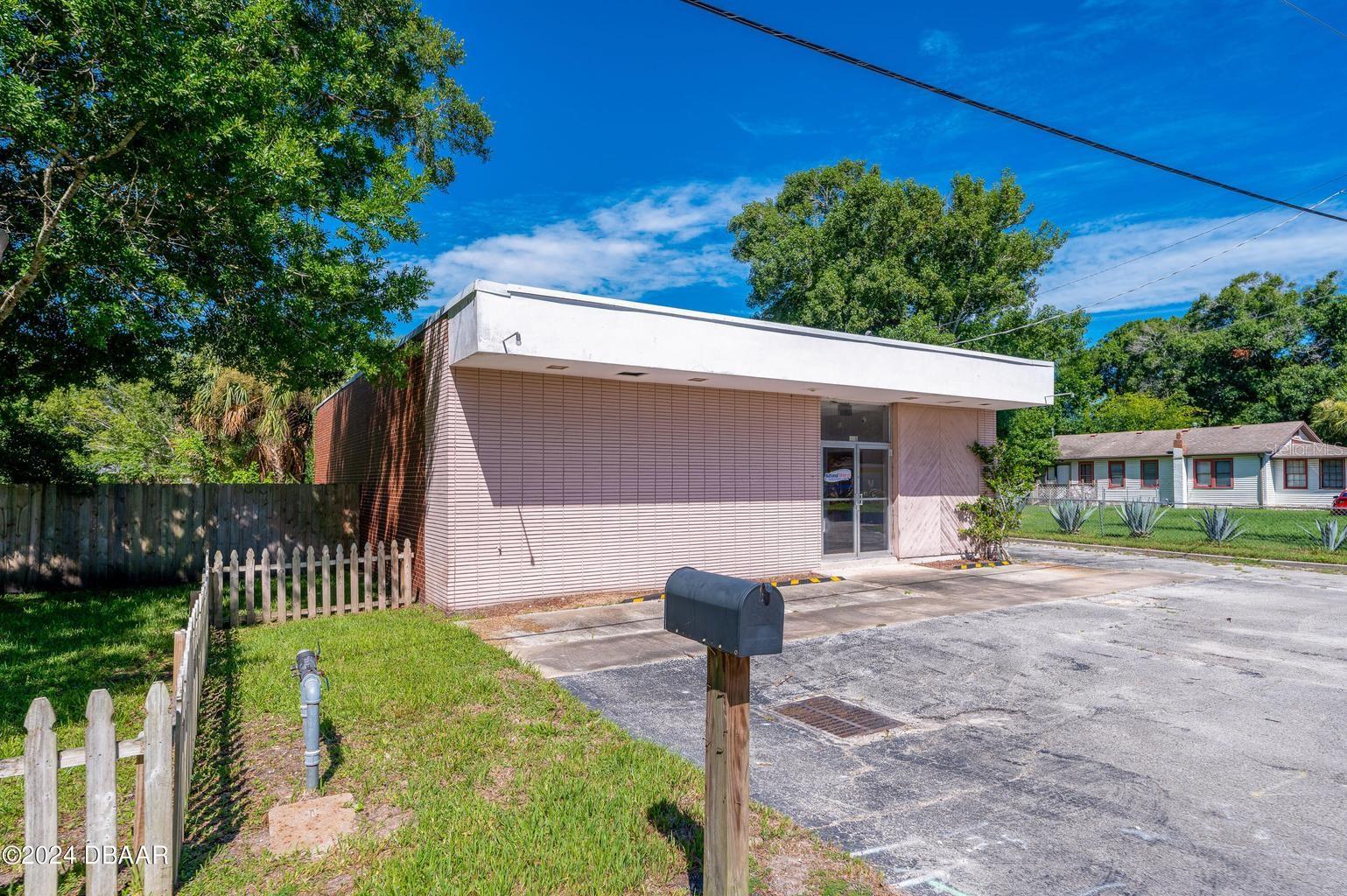 Commercial building opportunity. Former old Post Office back in the day. This has yard space and backs up to another parallel street. Ordinally listed as a 3-parecl sale and can still convey with the vacant lot and house next to it for $950,000 or best offer. This has multiple office along with open floor space which can be more multiple uses. Great opportunity for the right user.