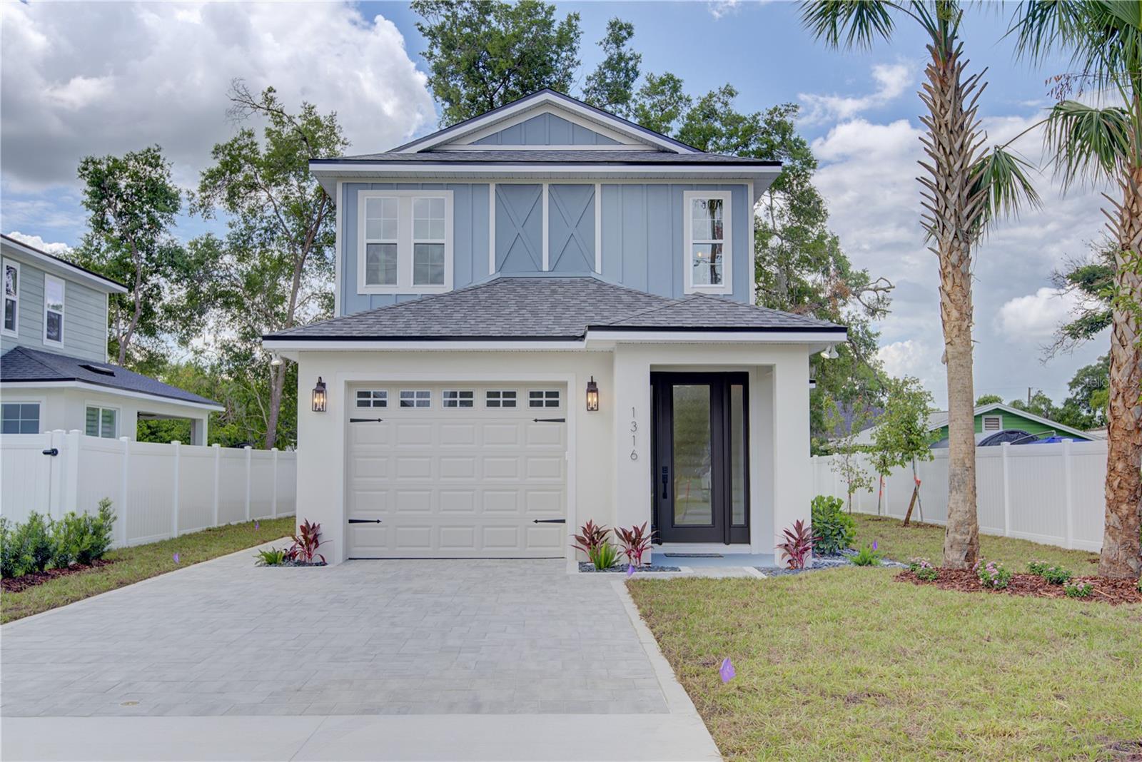 Virtually Staged. Stunning brand new custom-built home just steps from historic downtown Mount Dora! This beautifully designed 4-bedroom, 3.5-bath residence is ready for immediate move-in and offers the perfect blend of modern luxury and small-town charm in a golf cart-friendly community. Featuring two primary suites, one on each floor, and laundry rooms on both levels for added convenience, this exceptional home showcases a French-inspired gourmet kitchen with quartz countertops, premium stainless steel appliances, elegant soft-close custom cabinetry, and high-end designer finishes throughout. Step outside to a spacious covered lanai overlooking a generous backyard, perfect for entertaining or relaxing, while additional highlights include a full irrigation system and attractive paver driveway. Enjoy all that Mount Dora has to offer, with boutique shopping, restaurants, festivals, and scenic Lake Dora just minutes away. Community amenities include a pool, tennis courts, baseball fields, dog park, mountain bike trails, disc golf, and the IceHouse Theatre, along with highly rated schools. Conveniently located with easy access to major highways, Orlando's theme parks, international airports, shopping, and Florida's beautiful beaches are all within reach.
