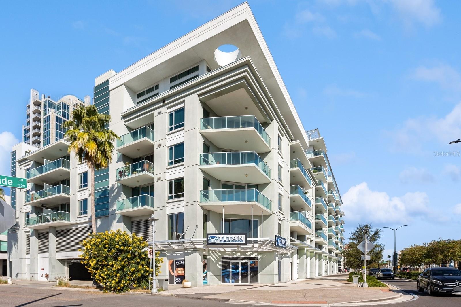 Take what you love and make it where you live at The Place at Channelside with this beautiful 1 bedroom, 1 bath condo nestled in the highly desirable Channel District in downtown Tampa.   This spacious open floorplan has many new updates, including new wood flooring throughout. Enjoy your gourmet kitchen with large center-island granite countertops, sleek wood cabinetry, stainless-steel appliances and custom tile backsplash. This unit is filled with great natural light with oversized sliding glass doors that lead to your private terrace. The master bedroom boasts huge windows as well as a spacious walk-in closet. The en-suite bath has an upgraded granite-top vanity and upgraded modern glass shower doors.  Custom accent lighting has been added throughput the unit, all light fixtures and chandelier are from Restoration Hardware. Enjoy the perfect views of the newly renovated balcony and amenities deck, featuring a heated pool, spa, custom sand-filled beach area and fitness center. Your unit incudes covered, gated, secured parking. The Channel District offers a pedestrian-friendly microcosm of Tampa Bay and has everything you need, from chic waterfront eateries—many with handy public boat docks—to popular family attractions and recreation areas.  Washington Street Dog Park is located directly out front, and is a great convince for all dog owners!   Call for your private showing today!
