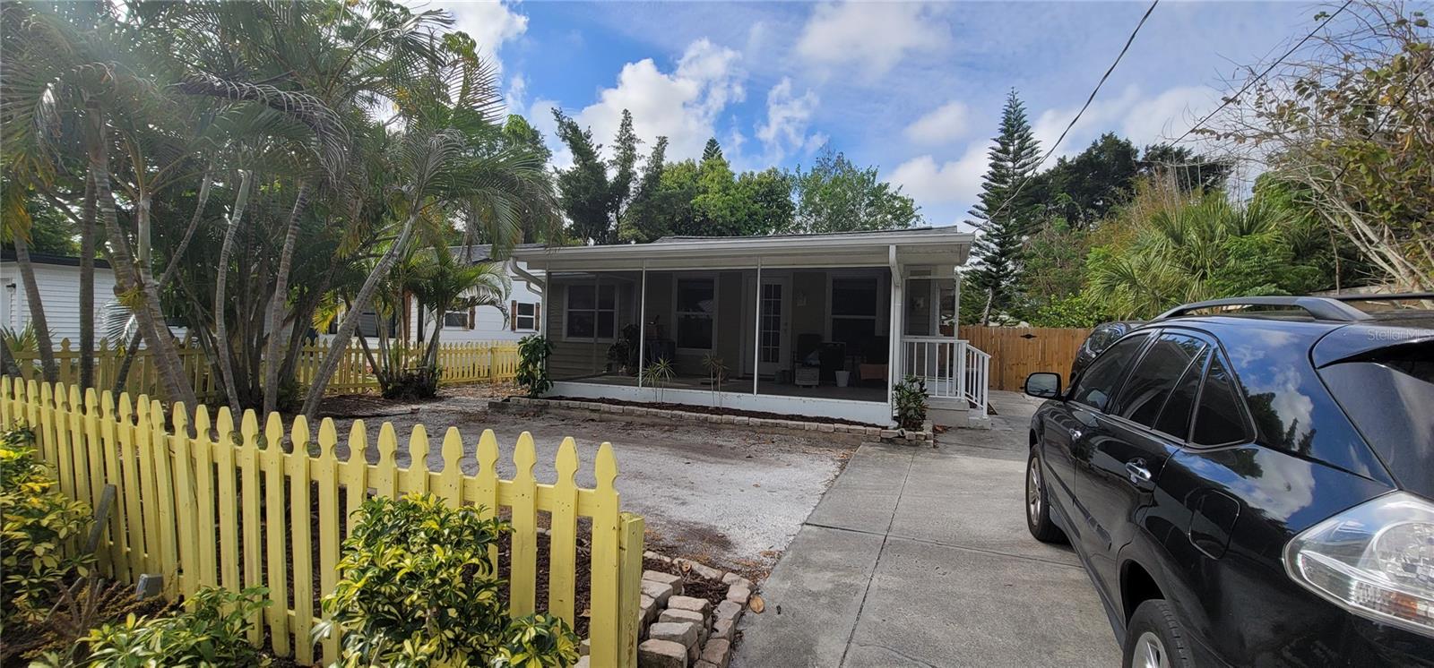 This cute bungalow style home is looking for someone to make it their own little paradise in Sarasota. The front boasts an enclosed patio and the drive way can accommodate many cars and even an R.V. with some tree trimming! The 2 bedrooms and 2 baths are separated for privacy and there is a bonus den/office for extra room. The above ground pol is surrounded by a manufactured patio and the zero scape yard means no lawn mowing around here! A shed and beautiful flowering plants surround the private fenced in yard.