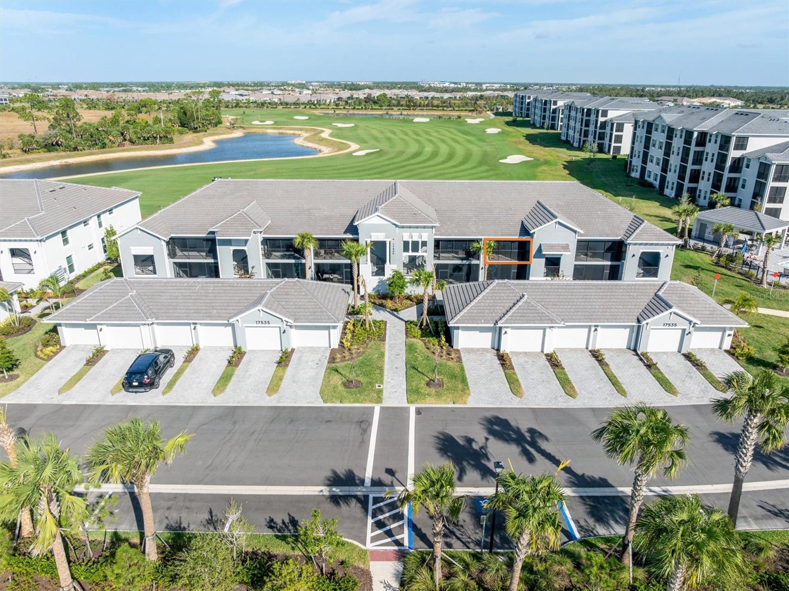 JUST REDUCED! This 2nd floor FURNISHED Veranda condo is all about easy living with a striking water and golf course view of the 5th fairway and a full GOLF MEMBERSHIP INCLUDED! Inside, the open floor plan feels bright and relaxed, perfect for entertaining or unwinding after a day on the course or at the beach. The split-bedroom layout offers privacy for guests, while the spacious den with a sleep sofa, easily doubles as a home office or extra sleeping space for visitors. You’ll love having a rear lanai to watch your friends shoot for the pin, and a front lanai, offering an additional room for family games, watching your favorite sports team or for outdoor dinner and drinks.
Wellen Park Golf & Country Club delivers the full resort lifestyle with a gorgeous pool and spa, lively tiki bar, lighted tennis, pickleball and bocce ball courts, a state-of-the-art fitness center, aerobics room, pro shop, full-service spa, and a dog park for your four-legged friends.
Located in Wellen Park, one of the fastest-growing master-planned communities in the country, you’re just minutes from beaches, boating, dining, shopping, and everything Southwest Florida living is all about. Whether you’re here seasonally or year-round, this is the kind of place where you can form amazing friendships and a lifetime of great memories!