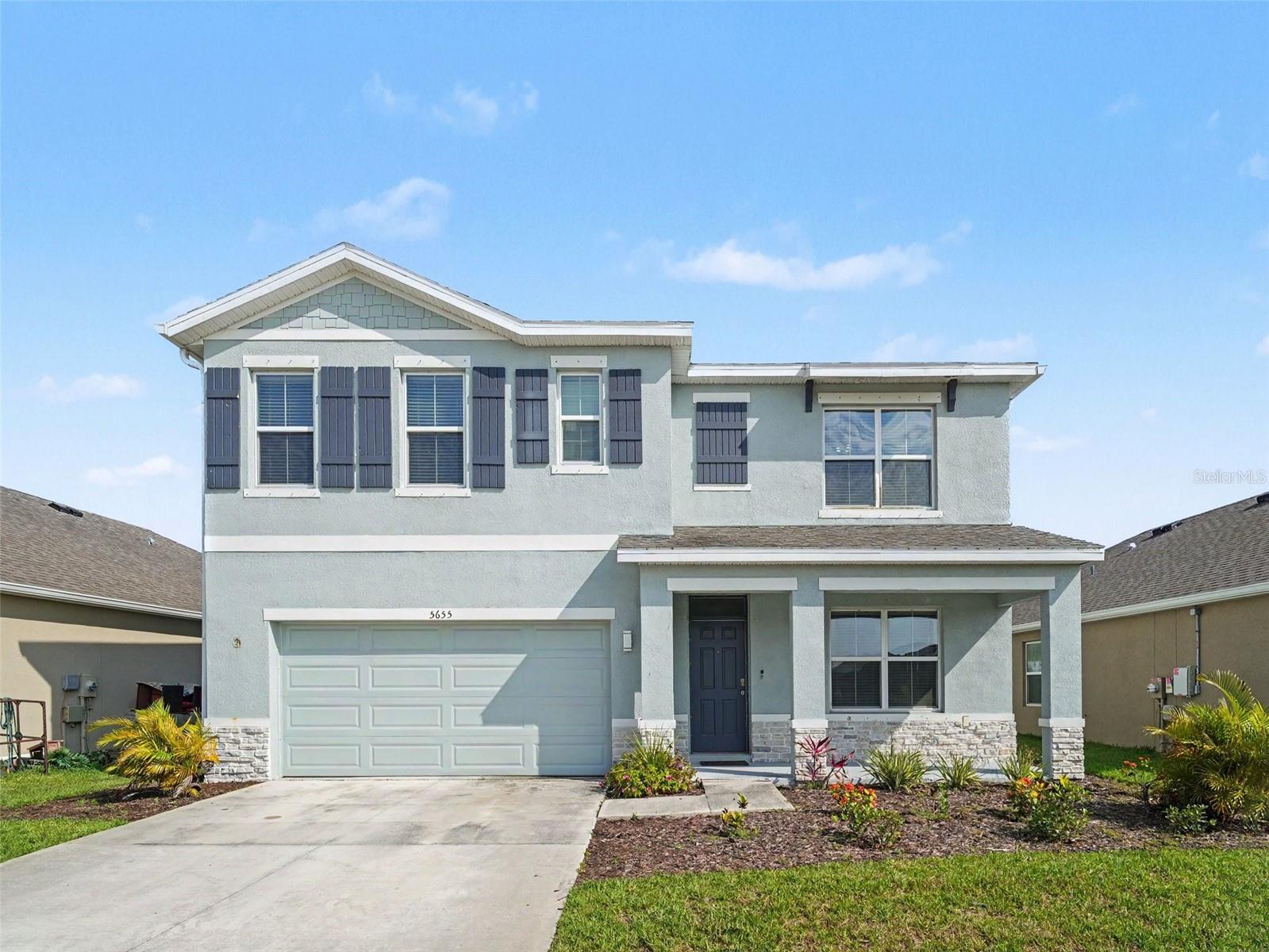 You will love this stunning newer home located on a cul-de-sac in popular Promenade Estates. This is a two-story home with five bedrooms, three bathrooms, and a bonus room. Open-concept floor plan flows seamlessly throughout the main level centering around  the Chef's kitchen. There is also a guest suite on the main level. Upstairs, a spacious owner's suite and three additional guest bedrooms, a full bathroom, and a convenient laundry room complete the second floor. . The home features an abundance of desirable builder upgrades throughout. The expansive backyard is quiet and private. Low HOA fee of just $226/month includes a resort-style pool, splash pad, playground, volleyball court, dog park, basketball court, and fitness center. Located outside of the flood zone. Walking distance to the Legacy Trail and Oscar Scherer Park.  A+ rated public schools. A short drive to award-winning beaches. Schedule a showing today!