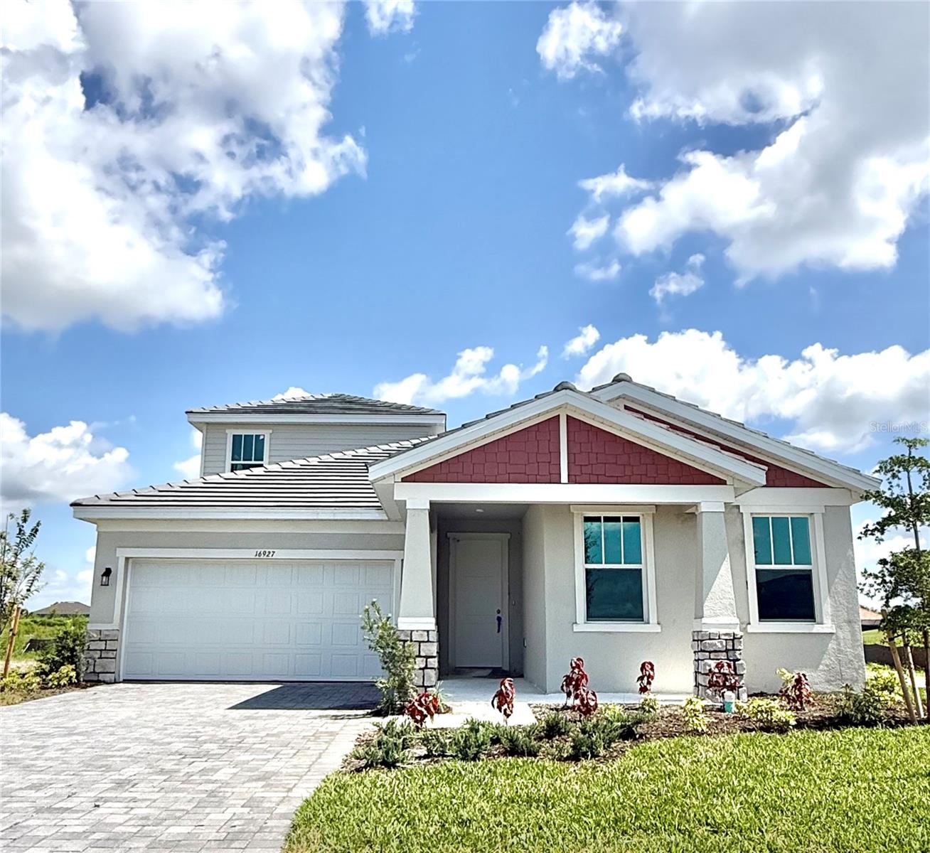 Virtually Staged. Under Construction. Enjoy elevated Florida living in the Ravenna II within River Hall Country Club. Positioned on a 7,838-square-foot homesite, this 2,699-square-foot residence offers 4 bedrooms, 3.5 bathrooms, and a 2-car garage. The open layout brings together the gathering room, dining area, and kitchen, highlighted by a center island and walk-in pantry for everyday convenience.

The owner’s suite is privately located and features a walk-in closet and spa-inspired bath. Additional bedrooms provide versatile space for guests, work, or quiet retreat areas. A covered lanai expands the living area outdoors, supporting relaxed evenings in a natural setting. River Hall Country Club includes a championship golf course, clubhouse, fitness center, resort-style pool, tennis, pickleball, bocce, cabanas, and walking trails.