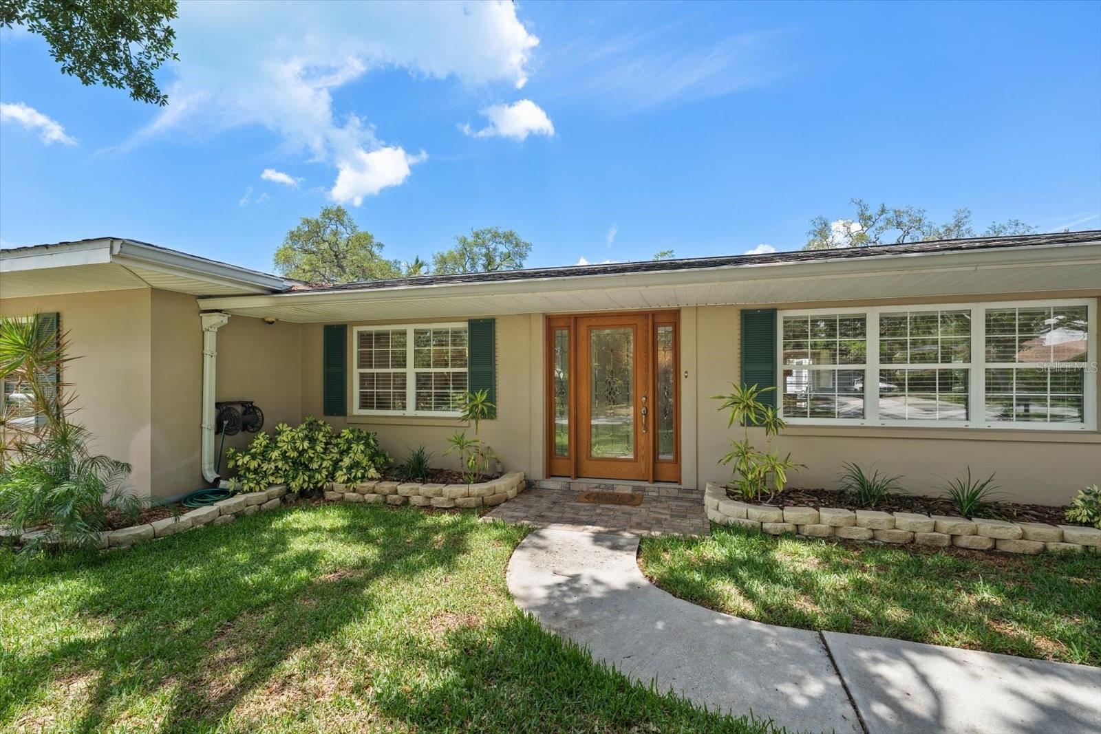 A rare gem in very desirable HARBOR BLUFFS! From the moment you enter, one will appreciate that this residence offers a perfect blend of spaciousness, an elegant layout, natural light and fine finishes. The floor plan flows smoothly, offering families with varied interest areas to spread out and appreciate this property that is designed for both daily living and impressive entertainment. A generous sized kitchen with large center island is the focal point of the house and will inspire any chef! Fully equipped, the kitchen offers stainless appliances, generous storage, and gleaming granite counters – imagine the culinary experiences!  Just steps away, a large family room with separate eat-in area provides ample space to gather or relax by the lovely fireplace. A three-way split bedroom floorplan, 2 with ensuite bathrooms, are all quite spacious, and allow for flexibility in use. Appreciate formal dining and living room areas-perfect for entertaining grandly. This home offers the best of all worlds; close to beaches yet not in an evacuation zone. Additionally, a lovely, inviting screened pool with an expansive side yard and deck offer privacy and endless possibilities for pets, play,  gardening or enjoying week-end bar-b-cue. The lot size is 100’ by 125’ and is completely fenced. Don’t miss this opportunity to live in a superb location, just a short drive from fabulous beaches, fine restaurants, shopping and major access roads to Tampa, St Pete and Clearwater Beach! Immediate opportunity too!