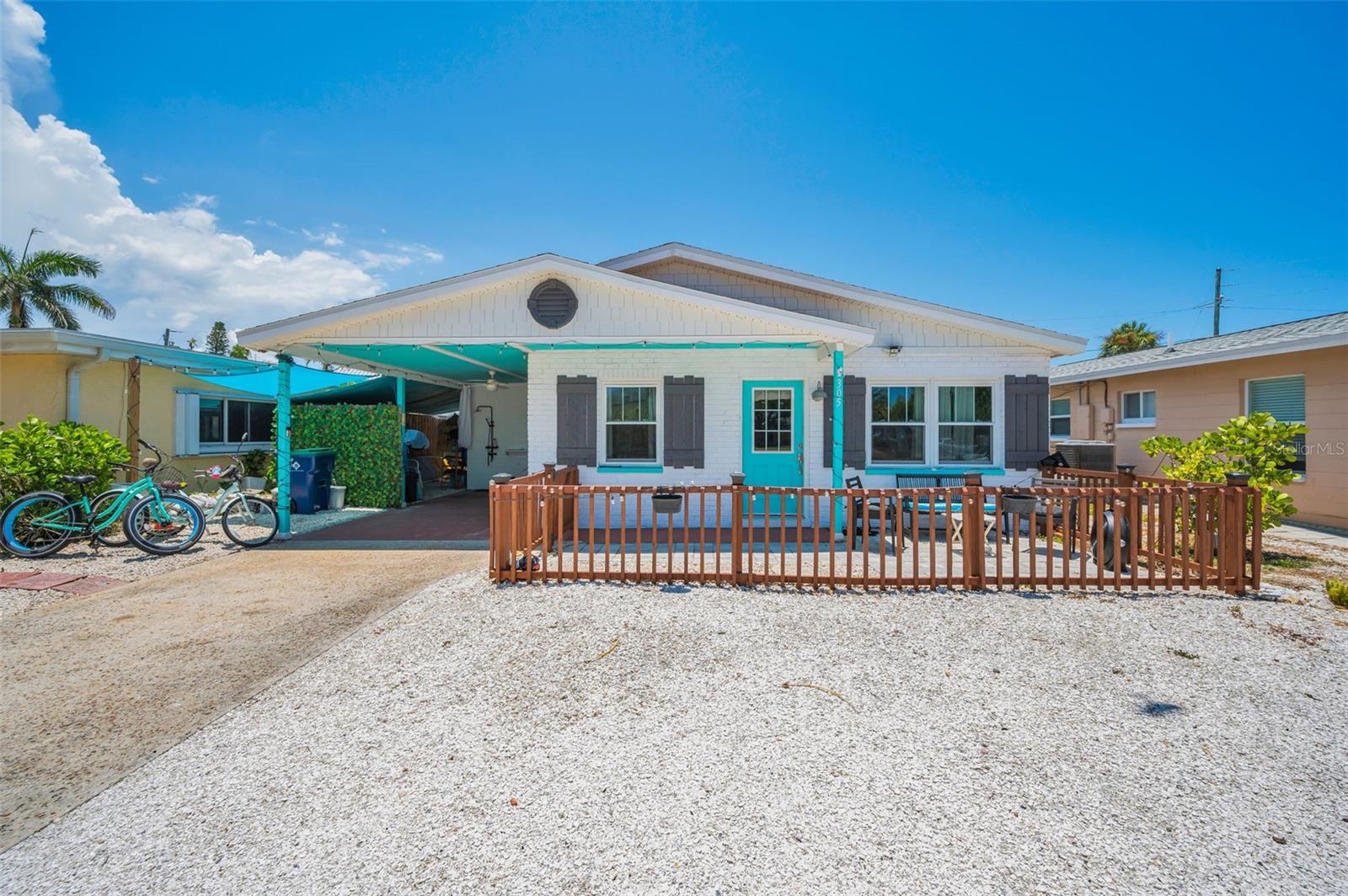 BEACH LIFE! YOUR PRIVATE OASIS AWAITS YOU! Updated, and Move-In Ready! No HOA! Relish in the TRANQUILTY of your very own PIECE of PARADISE while floating in your pool or entertaining poolside. Savor your morning cup of tea or end of day unwind in your covered patio or poolside tiki lounge. Indian Rocks Beach is a golf cart friendly community, and you are just minutes from shopping, restaurants, and entertainment. Your private getaway is just a walk (or golf cart ride) up the street to the beach. Experience the parks, tennis/pickle ball and basketball courts. Indian Rocks Beach residents not only have a RESIDENT ONLY boat ramp at the end of 15th there is also free beach access parking for residents with IRB decals. IRB offers beach life with culture as it is home to its own library and beach art center in addition to a waterfront nature park with the Seaside Seabird Sanctuary. The UPLIFTING and SOOTHING Blue White cabinetry and Quartz counters add the perfect touch of BEACH BUNGALOW vibe to your new home. The striking waterproof LUXURY vinyl flooring throughout your home provides a worry free living experience. No worries for the young ones or furry friends as the back is fenced in. The extra deep lot has ample space for additions if desired. *HVAC 2023 with a Honeywell airflow thermostat, exterior paint 2024, interior paint 2025, newer Stainless Steel appliances, roof 2018 with Hardie Board gable 2017. *Back impact door 2020 and Front/side impact entry doors 2022,  Simonton Coastal Impact Series windows 2019*  Both Tampa and St. Pete-Clearwater International Airports are short drives from your new BEACH OASIS home.