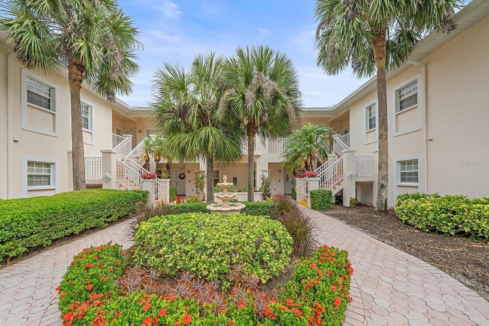 Located within the gated Palmer Ranch community of Plaza De Flores, this updated first-floor residence combines modern interior finishes, hurricane-rated construction, and a Sarasota address that puts Siesta Key Beach, the Legacy Trail, Gulf Gate dining, downtown Sarasota, and Interstate 75 all within minutes. Major improvements completed between 2022 and 2026 include a new roof, new carports, hurricane impact windows and sliders, a new AC system, and a comprehensive interior renovation, creating a property that is genuinely move-in ready and available optionally furnished. One of the more distinctive qualities of Plaza De Flores is its concrete construction between floors and concrete party walls between units, providing a level of sound insulation and structural integrity that sets it apart from most condominium communities in the area. Inside, the residence reflects a cohesive renovation with new ceramic tile flooring throughout, fresh interior texture and paint completed in 2025, new baseboards added in 2026, and plantation shutters installed throughout. The open living and dining layout flows naturally to a screened lanai, capturing the relaxed indoor-outdoor flow that defines everyday life in Southwest Florida. The kitchen was refreshed with all new appliances in 2024 and a new tile backsplash in 2026, while the guest bathroom received a full remodel the same year including a new vanity, mirror, lighting, and toilet. The primary bathroom features a newly retiled shower floor completed in 2026, and a newer washer and dryer round out the appliance profile. The property sits outside of any flood zone, and the well-maintained gated community offers a clubhouse, fitness center, tennis courts, community pool & spa. Siesta Key Beach, the Legacy Trail multiuse path, Gulf Gate shops and restaurants, Sarasota Memorial Hospital, Costco, Sarasota-Bradenton International Airport, and Interstate 75 are all within a short drive, with downtown Sarasota's waterfront dining, arts venues, and cultural district just beyond.