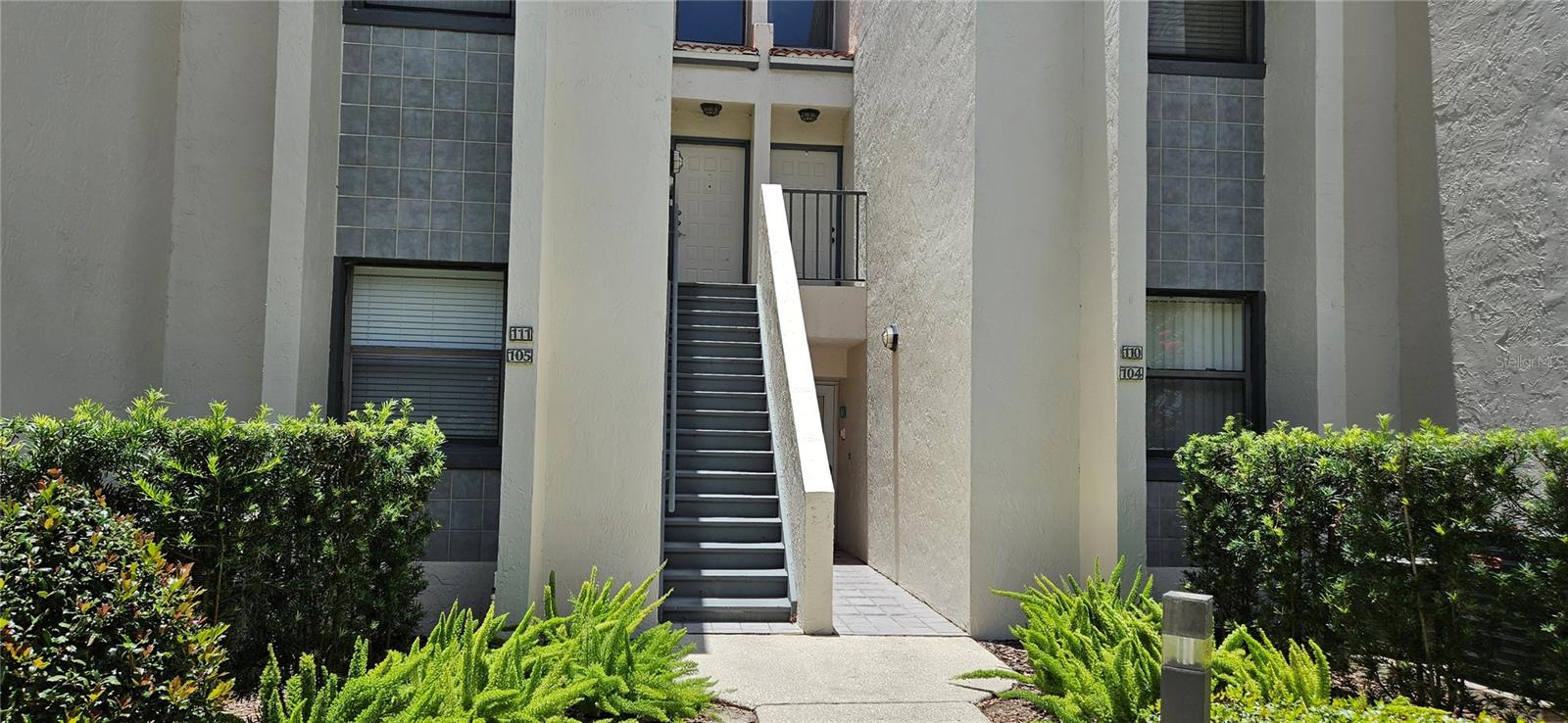 Beautiful lake-view condo in Winterset! This ground-floor 2-bedroom, 2-bath residence offers amazing views of Lake Winterset, part of the renowned Winter Haven Chain of Lakes. The spacious great room features tile flooring, sliding glass doors to the screened porch, and stunning lakefront vistas. Just off the kitchen is a comfortable dining area, creating an inviting space for everyday living and entertaining. The kitchen is beautifully appointed with custom Kraft Maid wood cabinetry, granite countertops, a breakfast bar, and a complete appliance package. The primary bedroom enjoys peaceful lake views and includes plush carpeting with a gel pad, a large 11' X 7' walk-in closet, a ceiling fan, sliding doors to the patio, and an en-suite bath featuring dual sinks, quartz countertops, and an oversized walk-in shower with a seamless glass door. The guest bedroom is generously sized at 13' x 10', offering ample closet space and convenient access to the guest bathroom, which features quartz countertops and tile flooring. The screened porch is the perfect place to relax and enjoy breathtaking lakefront views and spectacular sunsets.

Residents enjoy true resort-style living with access to a community clubhouse, pool, spa, shuffleboard courts, tennis & Pickleball courts. The highly desirable location offers close proximity to shopping, dining, schools, medical facilities, and LEGOLAND Florida Resort. Additional features include a private storage room off the patio, inside laundry, a tile roof, air conditioning, 24-hour security, meticulously maintained grounds, assigned parking, and ample guest parking. This is Florida lakefront living at its finest.