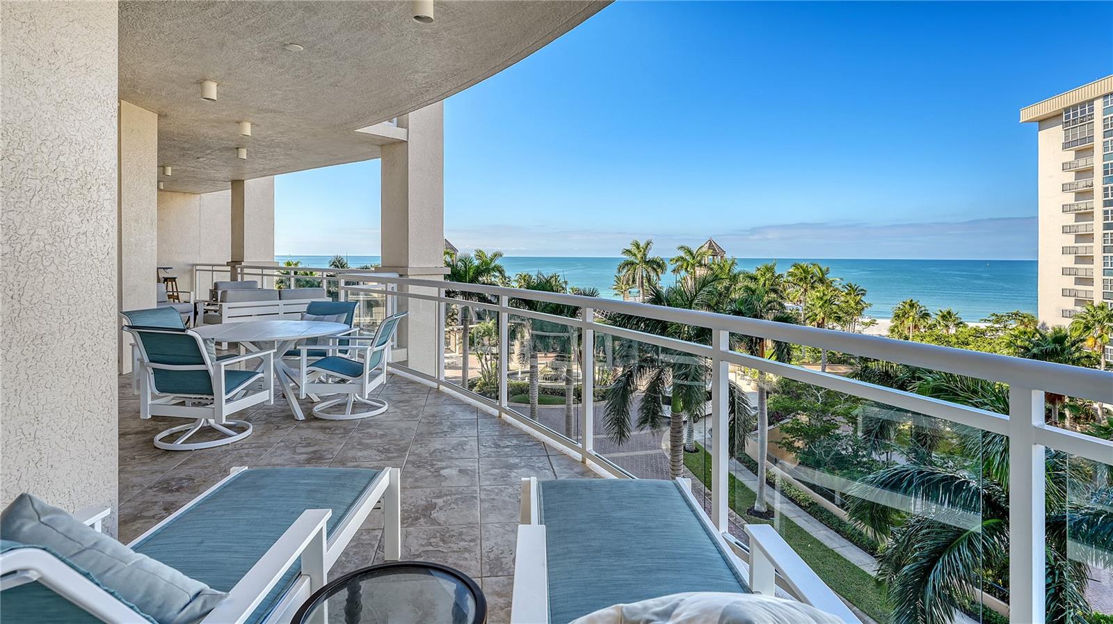 Gulf-Front Luxury at The Beach Residences — Ritz-Carlton Living on Lido Key! Ideally located on the 5th floor of The Beach Residences at the Ritz-Carlton, this expansive three-bedroom Estate residence showcases sweeping Gulf views and the signature lifestyle only Ritz-Carlton ownership provides. With 3,300+ square feet of interior living space and more than 600 square feet of private terrace, this property delivers coastal elegance and remarkable comfort in one of Sarasota’s most exclusive beachfront addresses.
A private elevator opens to a welcoming foyer and gallery hall, revealing a dramatic Grand Salon framed by walls of glass and tranquil Gulf panoramas. Marble flooring, refined architectural details, tray ceilings, and custom built-ins elevate the sense of scale and serenity throughout. Designed for effortless entertaining, the open living and dining areas connect seamlessly to an oversized Gulf-facing terrace—perfect for sunset gatherings or quiet mornings with ocean breezes.
The gourmet kitchen pairs functionality with style, offering solid-wood cabinetry, stone counters, a center island, and high-end stainless appliances including built-in ovens, gas cooktop with grill, wine refrigeration, and large pantry. A cozy breakfast area with floor-to-ceiling glass makes every meal a waterfront moment.
The primary suite is a private retreat, complete with dual walk-in closets, morning kitchen, terrace access, and a luxurious en-suite bath featuring dual vanities, soaking tub, large shower, and private water closet. Two additional guest suites, one is a generous master-sized suite, provide privacy for family and visitors. Additional features include a spacious laundry room, hurricane-rated glass throughout, custom built-ins, and a gas fireplace.
Exclusive to this residence, two premium parking spaces and a secure storage unit are included. The available Gold Ritz-Carlton Members Club membership further enhances this offering, providing access to premier golf, spa, and beach club facilities (refundable deposit required).
The Beach Residences delivers an unmatched amenities experience: 24-hour concierge, resident services, oceanfront pool and spa, outdoor grills, spacious social lounge, media room, billiards, library, full gym, sauna, massage rooms, and elegant guest suites for overflow accommodations. A private, resident-only beachfront path invites direct access to pristine sand and turquoise waters.
Ideally positioned on prestigious Lido Key, the location blends coastal tranquility with immediate convenience. Enjoy nearby dining on St. Armands Circle, boutique shopping, luxury spas, and walkable beach cafes. Sarasota’s celebrated arts and culture—including the Van Wezel, Sarasota Opera House, Orchestra, The Bay Park, and downtown galleries—are just minutes away. Marina Jack, Selby Gardens, Burns Court, and the city's waterfront promenade offer endless recreational options.
A rare opportunity to own in one of Florida’s most refined seaside communities, this Gulf-front residence is more than a home—it's a private sanctuary shaped by world-class service, breathtaking vistas, and the effortless elegance only the Ritz-Carlton brand can deliver.