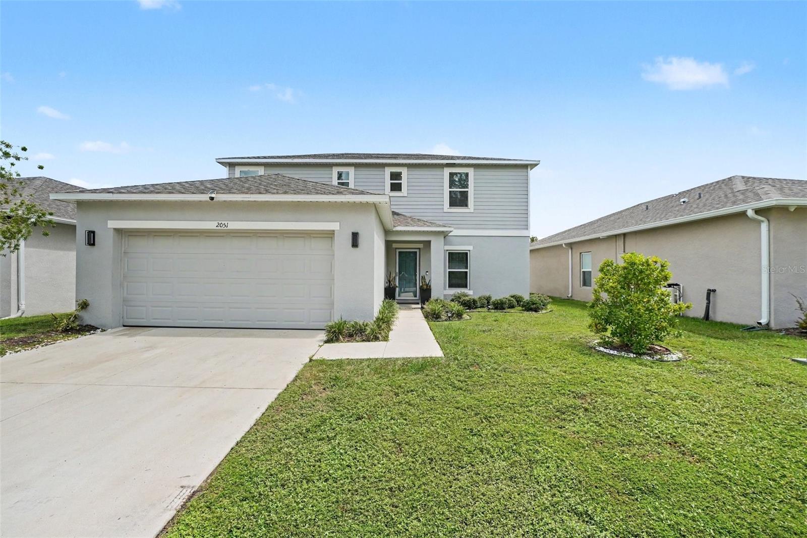 Welcome to Ironwood! Built in 2023, this beautifully maintained 4-bedroom, 2.5-bath home offers over 2,100 square feet of thoughtfully designed living space. The open-concept floor plan features a spacious kitchen overlooking the living and dining areas, creating the perfect setting for everyday living and entertaining.