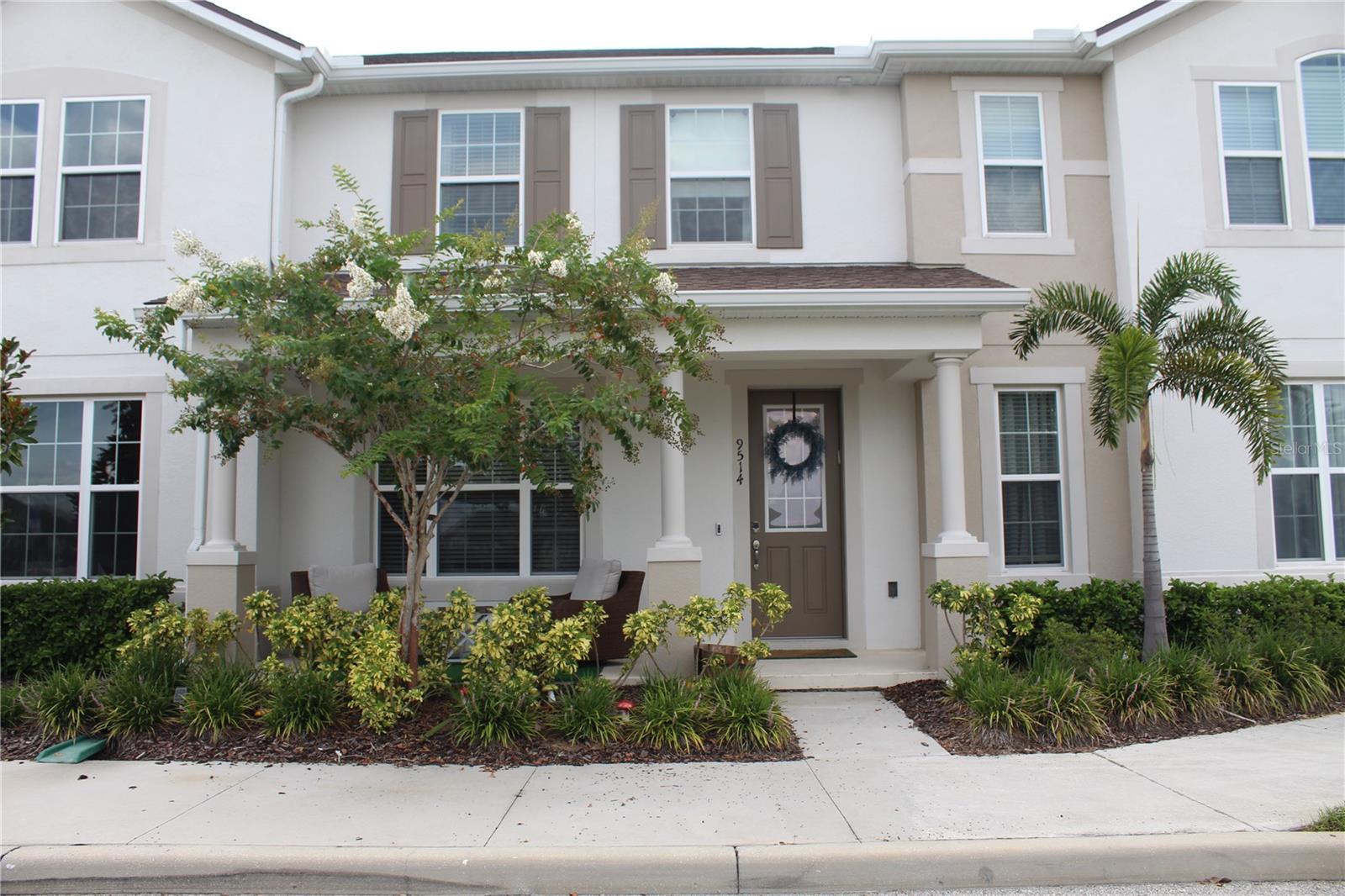 Beautiful Modern Townhome in Gated Randal Walk Community. This 3-bedroom, 2.5-bathroom townhome, built in 2022, features a spacious open floor plan with upgraded flooring, shaker-style cabinets, granite countertops, and modern luxury light fixtures.  Upstairs, the large master suite includes a walk-in closet, dual vanities, a walk-in shower, and a private water closet. A cozy loft area located off the master leads to a private outdoor balcony—perfect for relaxing. Two additional bedrooms and hall bath are situated at the opposite end of the hallway for added privacy. Washer and dryer are conveniently located upstairs. Enjoy rear-entry garage access with a downstairs mudroom drop zone. Located on a quiet street just steps from the community pool, cabana area with outdoor grills, and playground. This interior unit is away from the main road and is walking distance to the neighborhood elementary school. Exterior grounds maintenance, pest control and access to all community amenities are included in the monthly rent. Call to book your private showing today.