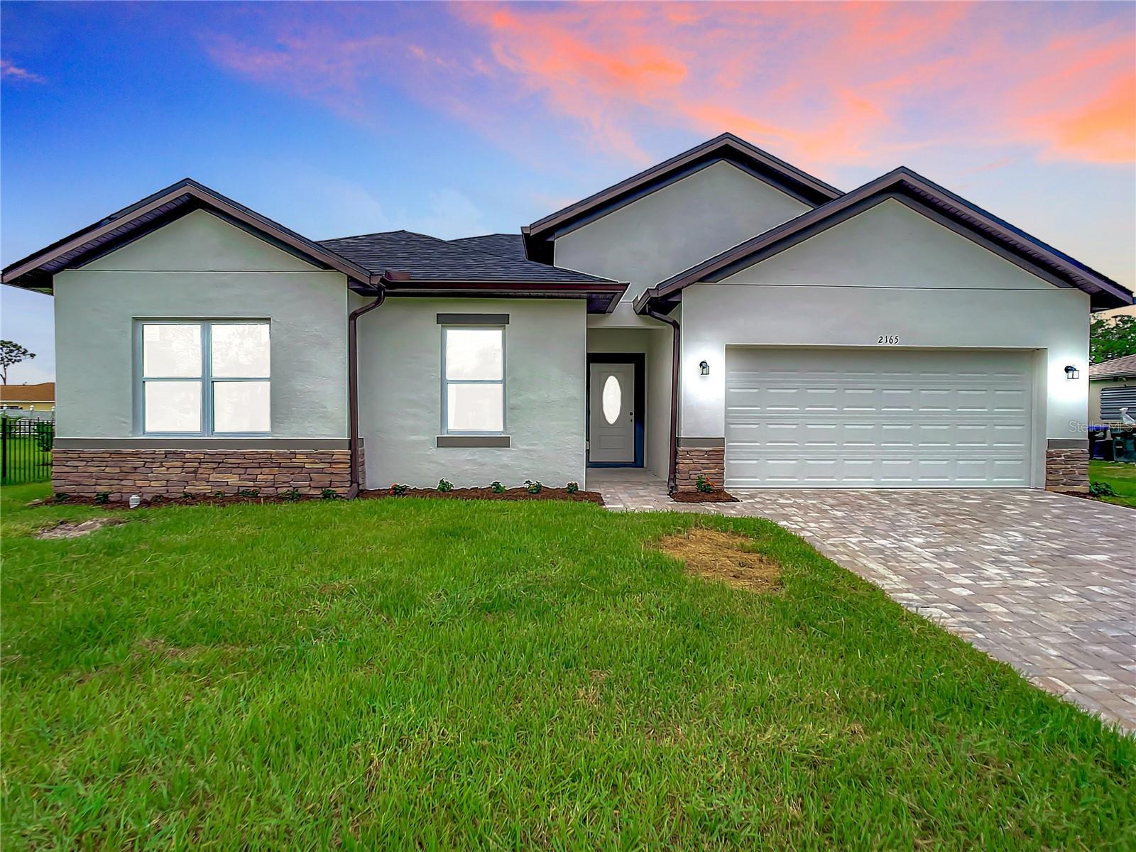 One or more photo(s) has been virtually staged. This beautifully finished home is perfectly located just 30 minutes from the stunning beaches of Manasota Key, Siesta Key, and surrounding coastal areas. Designed with comfort and style in mind, it offers 3 bedrooms, 2 bathrooms, plus a flexible bonus room ideal for a home office or extra living space.
The home features luxury flooring throughout and a modern kitchen with quartz countertops and new stainless steel appliances. Impact-resistant doors and windows, along with a paver driveway, add both style and durability.
Conveniently located near restaurants, shopping, parks, and schools, this home is in a great area. It is truly move-in ready. Contact us today to schedule a showing.