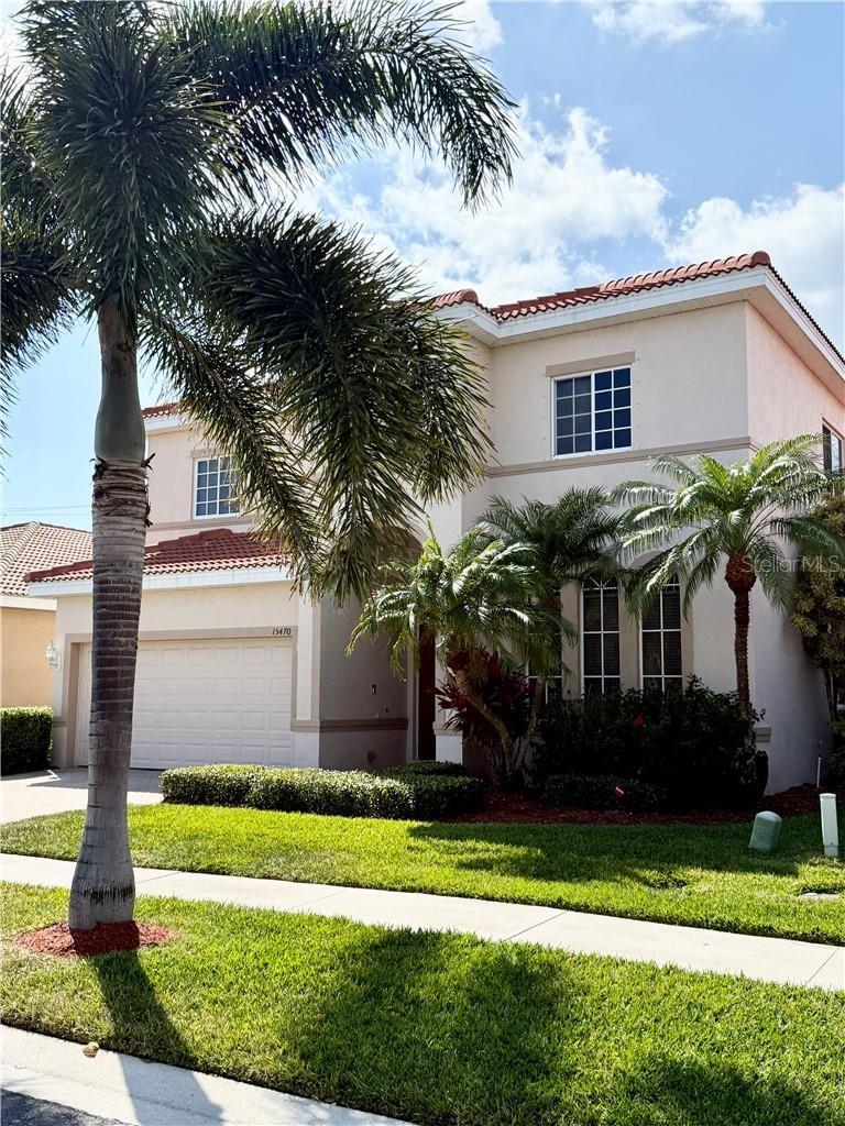 ONE YEAR HOME WARRANTY.  Experience luxury living at Laguna Lakes in this beautifully maintained home in Santa Barbara Subdivision! This two story home, in the gated community of Laguna Lakes, is conveniently located near Health Park Medical Center, including Golisano Children's Hospital. Amenities galore... including pickelball, tennis, playground, volleyball, basketball, resort style pool, billiards, spa & hot tub, fitness club & sidewalks.  The home features a two car attached garage, WITH an ELECTRIC CHARGING STATION, 5 spacious bedrooms, 4 baths, with one of those bedrooms being downstairs making this a perfect layout for a multigenerational family. This home offers plenty of room for family, entertaining, and guests. Inside, you'll find a large chef’s kitchen with an island, solid-surface counters, stainless appliances, adjacent eat-in dining area, plus a family room. There is also a dining room area in the front living room for flexible dining and living space. The huge primary suite features a luxurious bathtub and separate shower, dual sinks and two walk-in closets. For peace of mind, this home is equipped with hurricane shutters and security system and sits on the hospital power grid so outages are unlikely. Located just minutes from SWFL Beaches, churches, shopping, public library, and local family owned restaurants. This home blends comfort, style, and location all in one package—don’t miss your chance to make it yours!