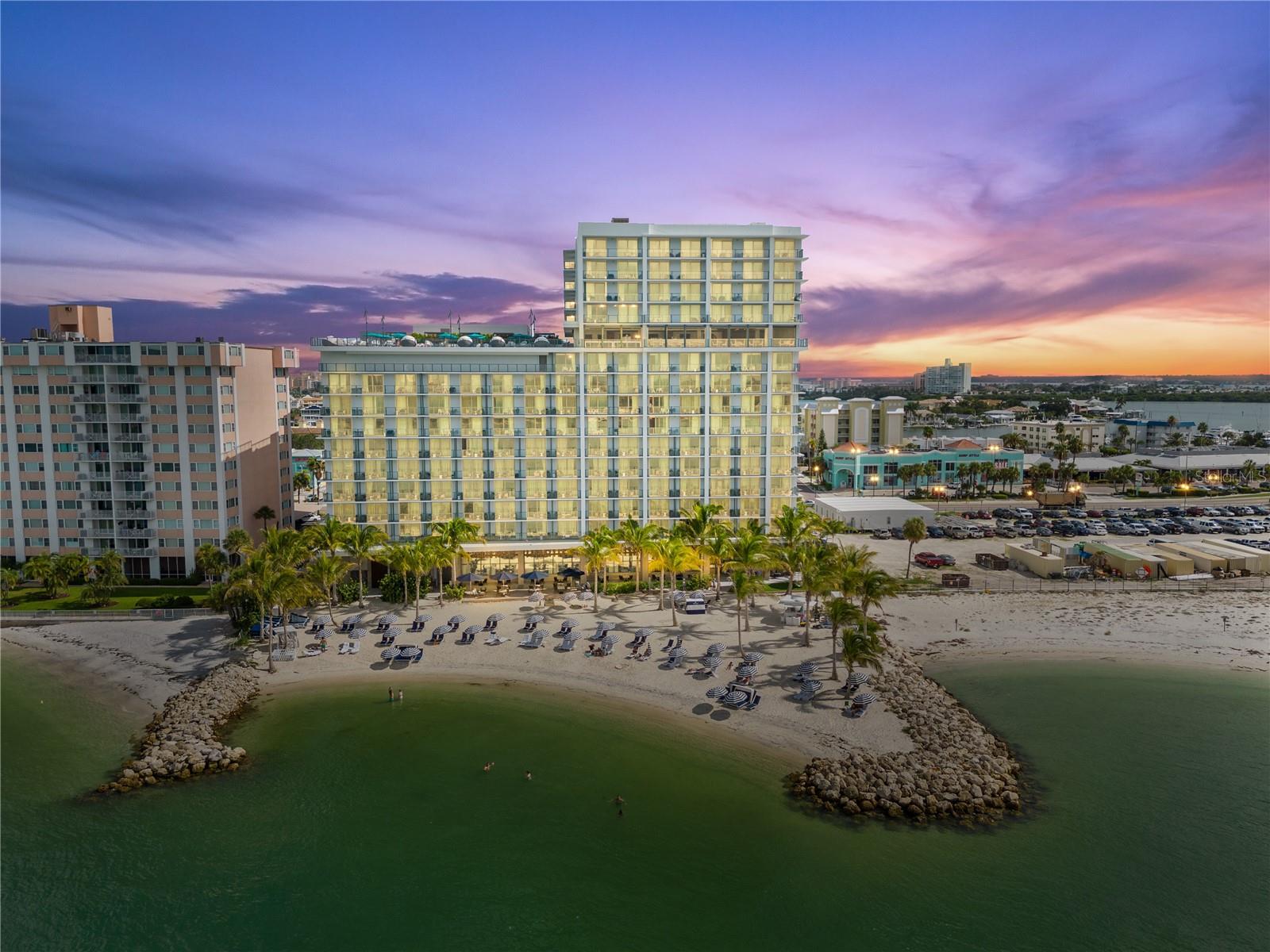 Experience an exceptional coastal lifestyle where the legendary VIP guest service of the JW Marriott brand seamlessly merges with the advantages of vacation home ownership. Completed in 2023, this exclusive 15-story boutique tower presents a rare collection of only 36 private residences along a secluded stretch of Clearwater Beach—consistently recognized as “America’s Best Beach.” Designed to deliver the comforts of a private retreat with the conveniences of a world-class resort, it offers a level of luxury, service, and exclusivity seldom found on Florida's Gulf Coast.

From relaxing beside the resort’s rooftop pool or private beach to enjoying breathtaking Gulf of Mexico views from your own balcony, every moment is designed to inspire tranquility and elevate the senses. Indulge in the resort’s curated collection of food and beverage venues, where exceptional service and sophisticated surroundings create a truly effortless lifestyle.

Positioned on the 12th floor, this stunning oceanfront residence offers 3 bedrooms, 3 bathrooms, and 1,698 square feet of thoughtfully designed living space. An expansive private terrace showcases unobstructed western views, where spectacular sunsets and endless horizons become part of your daily experience. Meticulously appointed with high-end furnishings and designer fixtures throughout, the home reflects a commitment to quality and refined coastal elegance.

The open-concept floor plan seamlessly connects the kitchen, dining, and living areas, creating an inviting setting for entertaining or enjoying meaningful time with family and friends in a relaxed, luxurious atmosphere. Offered fully furnished to JW Marriott brand standards, the residence includes a limited kitchen and in-residence washer and dryer for added convenience.

Ownership includes access to an impressive collection of resort amenities, including a rooftop pool with poolside bar and grill, a state-of-the-art fitness center featuring a sauna and steam room, a full-service Spa by JW, concierge services, front desk reception, valet parking, security personnel, dedicated engineering and maintenance teams, and professional housekeeping services when needed. Residents also enjoy the convenience of in-residence spa treatments and fine dining service, in addition to a waterfront restaurant and quick-service food and beverage offerings.

More than a residence, this is a gateway to the vibrant coastal lifestyle of Clearwater Beach, with shopping, dining, the marina, and convenient access to both Tampa International Airport and Clearwater/St. Petersburg International Airport just moments away.

Owners may occupy their residence for up to 30 days at a time. Please note these properties are not eligible for a Homestead exemption. Additionally, this luxury condo-hotel presents outstanding income potential through world-class on-site property management by Marriott International.