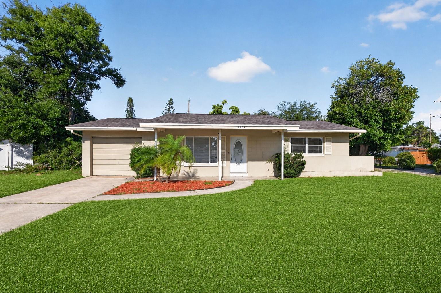 ~FOR LEASE~ Welcome to this charming and well-maintained 2-bedroom, 1.5-bath rental nestled on a quiet cul-de-sac in the heart of Seminole. This inviting home features a spacious living room plus a bright Florida room, providing plenty of space to relax, entertain, or work from home. The attached garage includes a convenient half bath and a full-size washer and dryer.

Step outside to enjoy the oversized fenced backyard, perfect for outdoor living, pets, or weekend gatherings. Ideally located just minutes from the Gulf beaches, top-rated shopping, restaurants, parks, and everyday conveniences, this home offers the perfect blend of comfort and location. Don't miss this opportunity to enjoy Florida living in a desirable Seminole neighborhood.