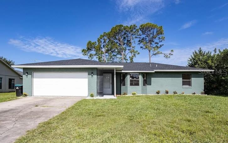 Short Sale. This property features a spacious living area with an open floor plan. The backyard provides a nice usable outdoor space along with a enclosed screened patio. Located in Palm Bay with convenient access to shopping, dining and local attractions.
