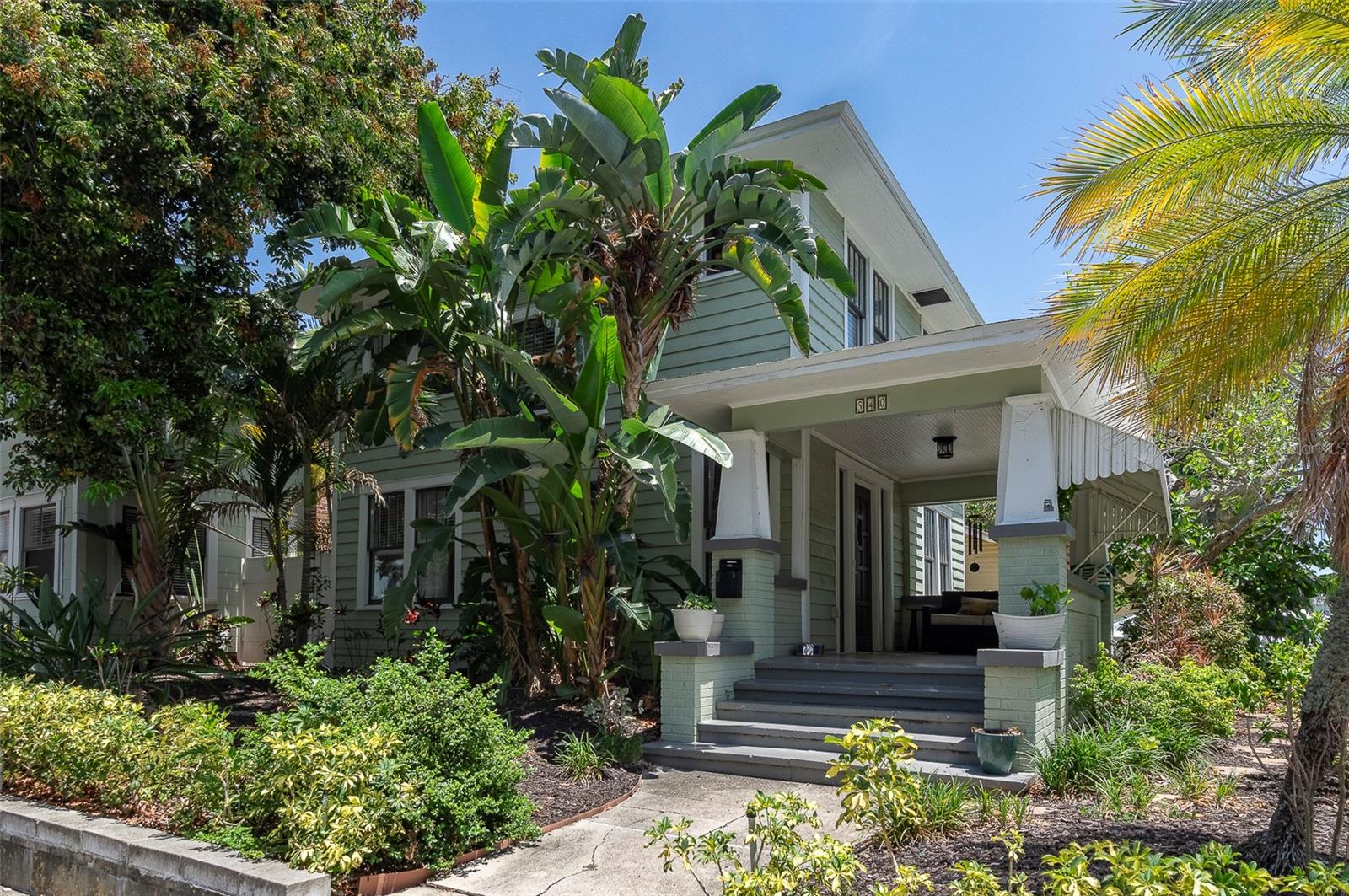 In the heart of Historic Uptown, just north of downtown St. Petersburg, this rare three-unit property offers the kind of character, location, and income potential that is increasingly difficult to find. Set on a tropically landscaped lot, the offering includes a standalone 3-bedroom, 1.5-bath residence at 540 11th Avenue N, along with a neighboring duplex at 532 and 534 11th Avenue N. Original wood floors, period doors and hardware, built-ins, covered porch space, and a private courtyard give each residence the warmth and personality that make older St. Petersburg homes so memorable. The front home offers light-filled living and dining spaces, three upstairs bedrooms, a main-level half bath, rear patio access, and a detached one-car garage. Behind it, the duplex provides two additional residences: an upper unit with flexible 2- to 3-bedroom living, updated kitchen and bath finishes, separate living and dining rooms, and in-unit laundry; plus a lower 2-bedroom unit with an enclosed front porch that can serve as a den, office, or quiet extra living space. Recent roof updates add peace of mind, while the existing tenant occupancy creates immediate continuity for the next owner. Whether held as an income-producing asset, reimagined over time, or enjoyed as a distinctive Historic Uptown compound near downtown restaurants, parks, waterfront amenities, and St. Petersburg’s vibrant cultural scene, this is a property with character that cannot be recreated and a location that continues to matter.