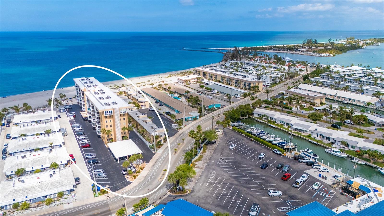 Wake up to Gulf views from this beautifully updated fourth-floor beachfront condominium on Venice Island. This two-bedroom, two-bath residence is offered turnkey furnished, making it move-in or rental-ready. The glass-enclosed lanai provides the ideal year-round space to relax and take in the coastal scenery, while the interior showcases tasteful updates throughout. Enjoy convenience of laundry facilities on each floor, plus your assigned covered carport space. The well-maintained building features a community pool and a new roof (2024), offering peace of mind for years to come. Ideally within short distance to the Venice Yacht Club, Freedom Boat Club, Crow’s Nest Restaurant, and the public boat ramp at Higel Marine Park. Just 1.4 miles away, explore the charm of downtown Venice with its boutique shopping, dining, entertainment and year-round events at Centennial Park. Nearby amenities also include the weekly farmer’s market, recreational courts at Hecksher Park, the Venice Art Center, the Venice Public Library and the Venice Community Center. With a flexible rental policy (one-month minimum, up to 12 times per year), this property is ideal for investors, a vacation getaway, or a future full-time residence. Experience the best of beachfront living with convenience, comfort and coastal charm all in one.