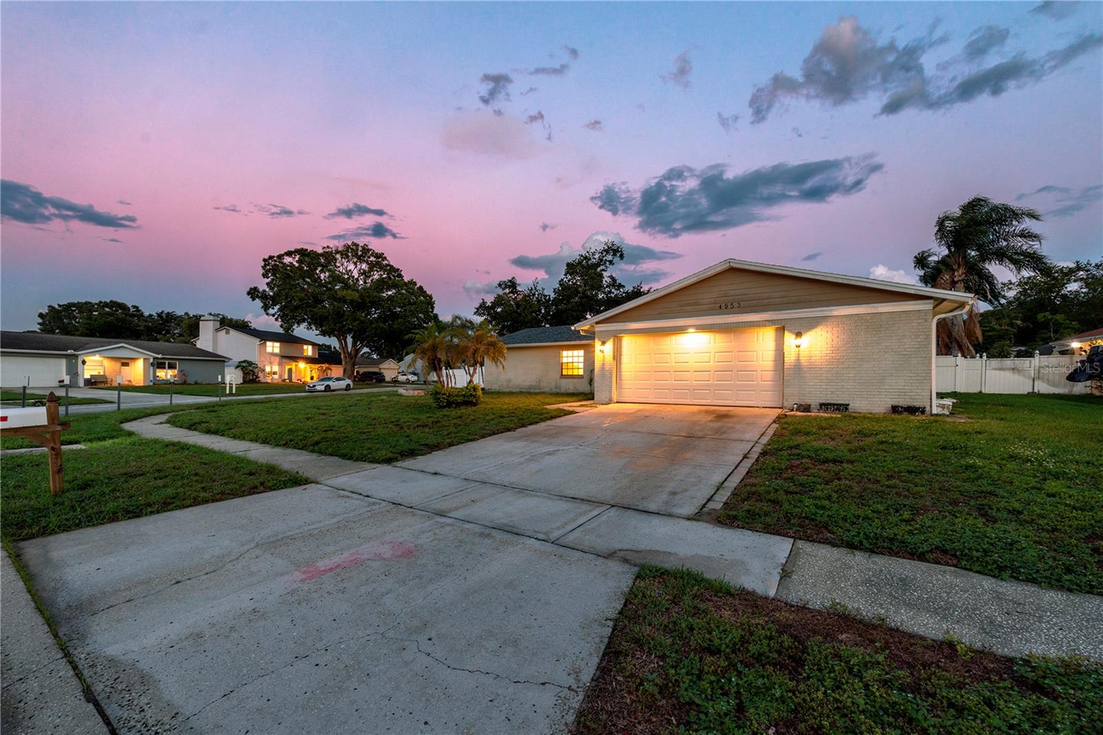 Choice oversized corner lot in Country Place West.  Drive gate to rear yard for out of sight parking of toys. Incredible outdoor grilling concrete cooking appliance. Double garage 20x20 plus 6x6 additional area. Many upgrades to home including granite countertops, top-of-the-line appliances and stylish cabinetry. Screened lanai off family room.  2 year old roof, high efficiency air conditioning system, Oversized den/ TV area. Convenient location near many neighborhood parks and recreation facilities.  Low HOA and No CDD's. Home is owner occupied so seller request at least a 6 hour minimum request of showing appointment.