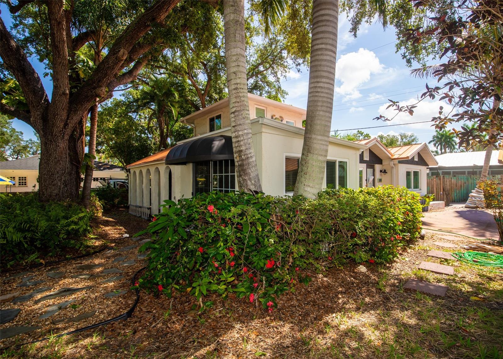 This home is located on a beautiful treelined street down from the Manatee River. Situated on a large corner lot, this 1925  two-story home with over 1500 square ft of living space gives you the ability on this oversized lot to add on or renovate as need be. Loads of potential in this property. Close to downtown restaurants and nightlife and to have a stroll down by the river. The home has already had some extensive renovations. A new metal roof currently being installed, new windows.