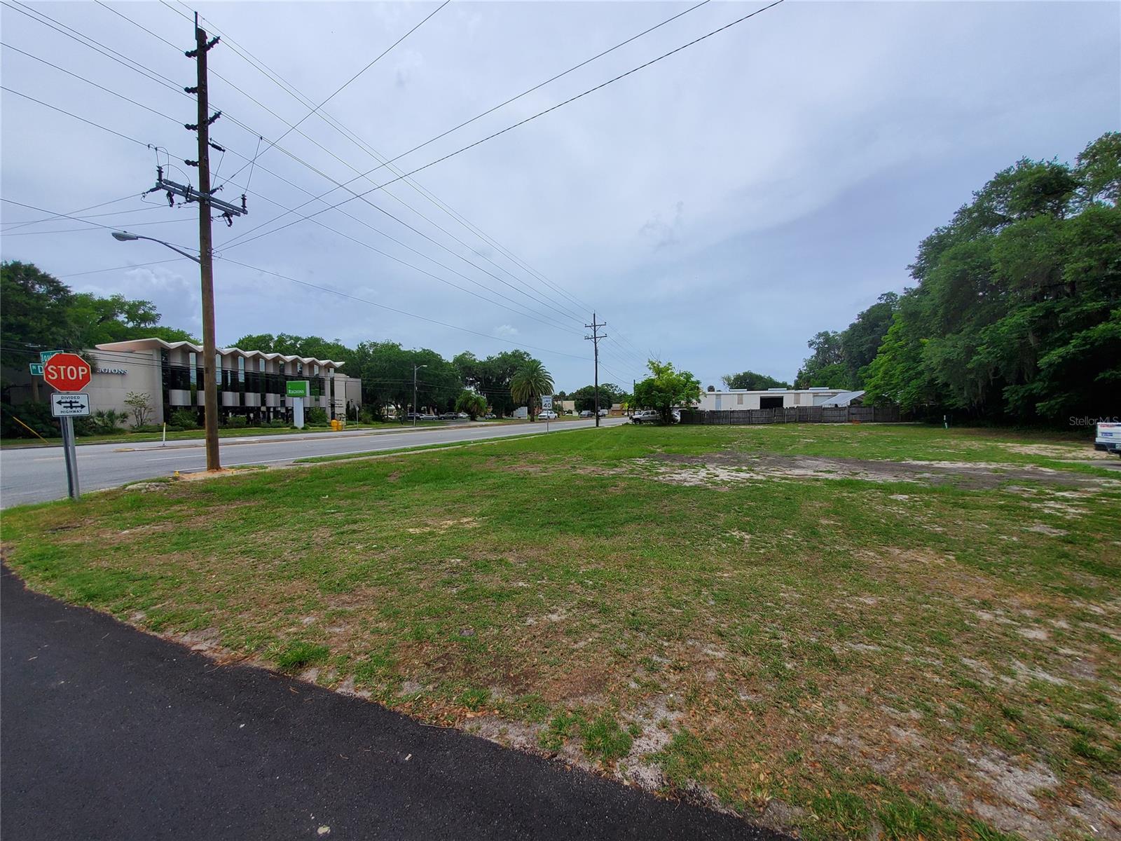 Cleared, commercial lot on high traffic corner with 150 feet of frontage directly on North Dixie Freeway (US1).  Property is zoned B-3 which allows for many options.  Seller has completed over $30,000.00 worth of site planning on the property which can be handed over to the new owner.  Impressive drive-by traffic lends to ample visual exposure.  Site is ready for development and close to downtown New Smyrna Beach, Port Orange and other active areas of commerce.