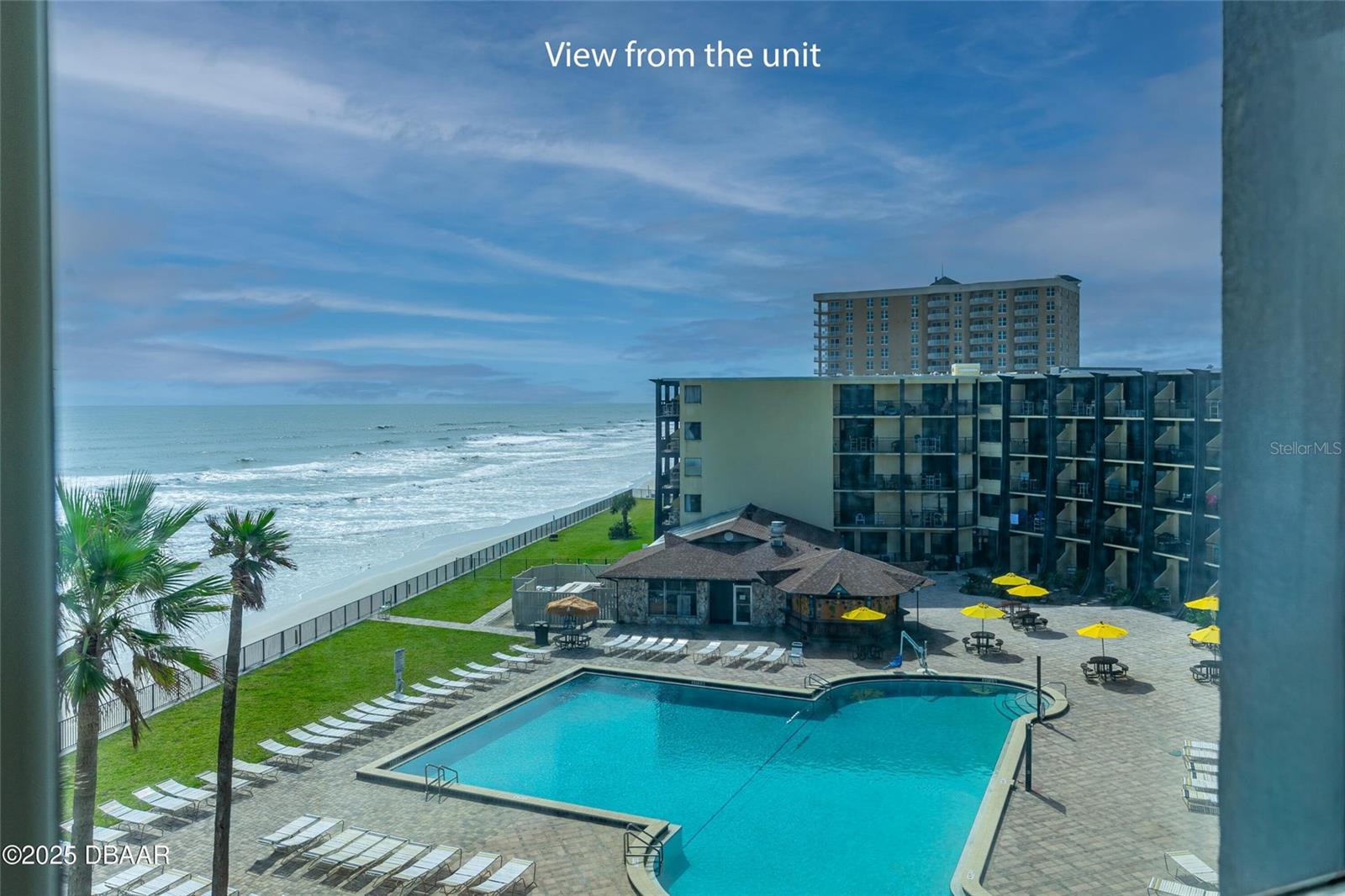 Affordable Oceanfront Investment — Top-Floor Studio at the Hawaiian Inn!

Start your mornings with breathtaking sunrises and sweeping Atlantic Ocean views from this top-floor, oceanfront studio condo. Offered fully furnished and move-in ready, this unit is an ideal opportunity for a personal beach escape, vacation retreat, or income-producing rental.

The studio is thoughtfully laid out with a queen-size bed, nightstand, dresser, cozy chair, and dinette, creating a comfortable and inviting space to relax after a day at the beach. The convenient kitchenette includes a refrigerator, sink, and microwave, while the updated bathroom adds a fresh, modern touch.

Located at the iconic Hawaiian Inn, owners and guests enjoy true resort-style living with a sparkling oceanfront pool, heated indoor pool, lobby gift shop, and game room. The on-site tiki bar is a local favorite, known for ice-cold drinks and some of the best cheeseburgers on the beach.

Perfectly situated near the Daytona International Speedway, shopping, dining, and entertainment, this is a rare chance to own an affordable slice of paradise on the World’s Most Famous Beach. Opportunities like this don’t last—schedule your showing today!