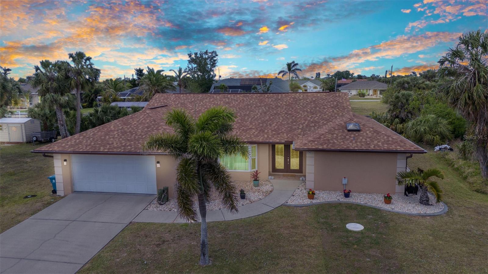Saltwater Canal Front, Pool Home, located on a quiet cul-de-sac in one of Port Charlotte’s most desired areas. This home has been completely updated which includes NEW roof, HVAC, hurricane garage door, beautiful remodel of the Kitchen and both Bathrooms, water heater, luxury vinyl flooring throughout, impact windows and accordion shutters, impact front door, pool resurfaced (2024) blown-in insulation, ceiling fans and so much more. An open floor plan that flows easily through the living areas to the outside lanai and pool area. Chef’s dream kitchen with oversized island, granite countertops, closet pantry, double ovens, soft close drawers and doors, upgraded Samsung appliances, and an easy pass through to the oversized Lanai. Don’t miss the stunning wine/coffee station with wine refrigerator. Primary en-suite has his/hers walk in closets with custom organizers, sliding glass doors to the pool, beautiful bathroom with dual vanities, spacious shower, skylight and private toilet room. Split bedroom plan, guest bathroom with access from the pool and large laundry room. From the comfort of your lanai, enjoy the panoramic sunset views that paint the sky each evening. Dock with water, electric and 10,000 lb lift provide access under one bridge to Charlotte Harbor and Gulf Waters. Located in the heart of Port Charlotte, close to hospitals, shopping and I-75. Come live your best life in SW FL and take advantage of all the sunshine state has to offer with World Famous Fishing, Nature parks, Award-winning Golf Courses, and stunning beaches on the Gulf of Mexico! Conveniently located near I-75, a quick 30-minute drive to Sarasota or Fort Myers, Charlotte County is home to the beautiful historic downtown Punta Gorda, Allegiant Sunseeker Resort and the Atlanta Braves and Tampa Bay Rays Spring Training Sports Parks! Don’t miss your opportunity to make this wonderful town YOUR hometown! *See Tour 1 for Virtual Walk Through* NO HOA or Deed Restrictions. Public Water AND Sewer – LOW transferable Flood Insurance ($2800). Home has never flooded.
