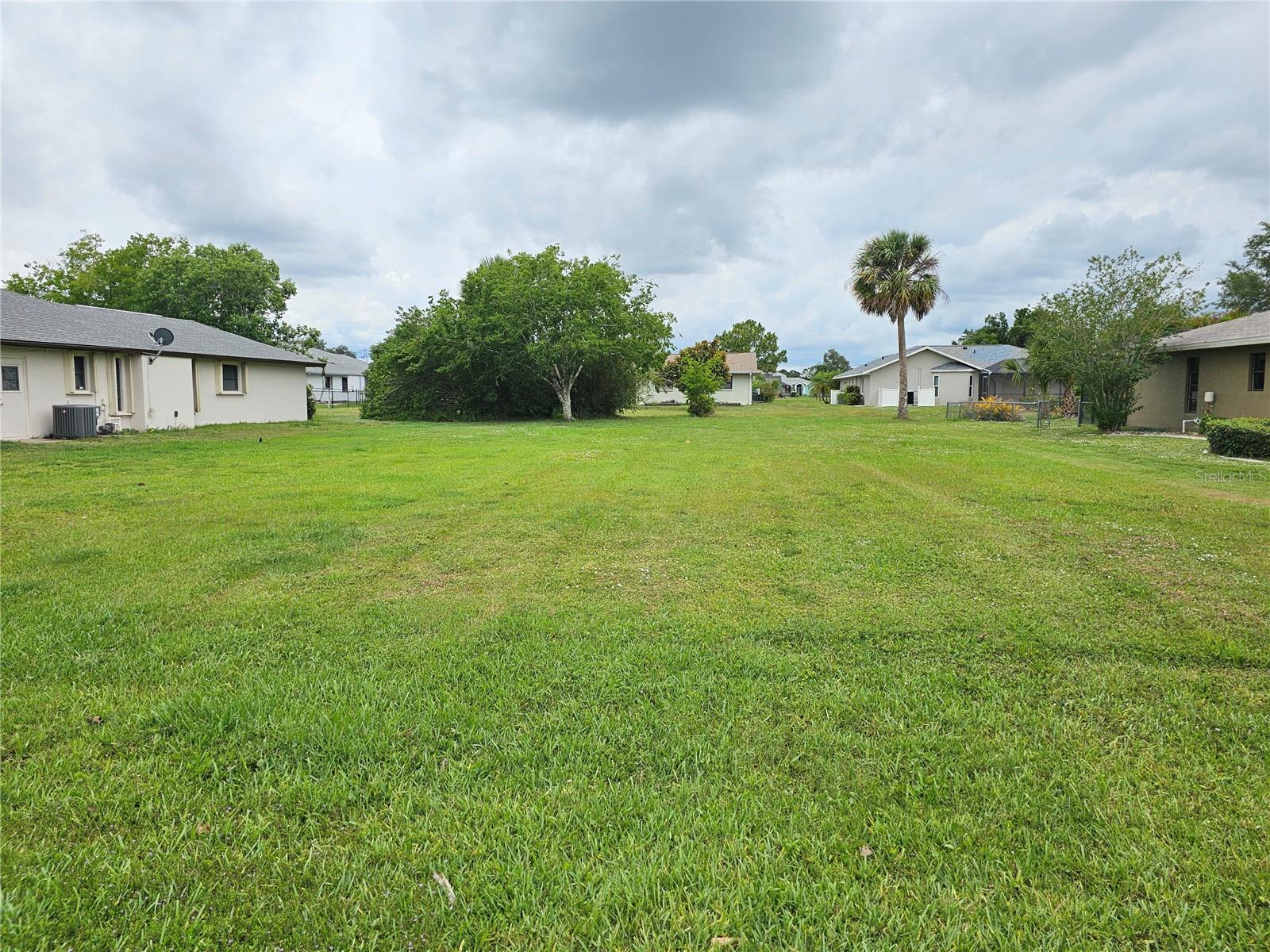 Discover an excellent opportunity to build your Florida dream home on this desirable cleared residential lot located in the sought after community of Deep Creek. NOT A FLOOD ZONE.  This property offers public water and sewer, a well maintained neighborhood setting, and convenient access to major roadways for easy travel throughout Punta Gorda and the surrounding Gulf Coast region. The lot sits in a quiet area with well kept homes nearby, providing a comfortable environment for full time living or a future seasonal retreat. With shopping, dining, golf, parks, and the beautiful Charlotte Harbor just minutes away, this location delivers both convenience and a relaxed Southwest Florida lifestyle. A great choice for buyers or investors looking for a quality homesite in a growing community.