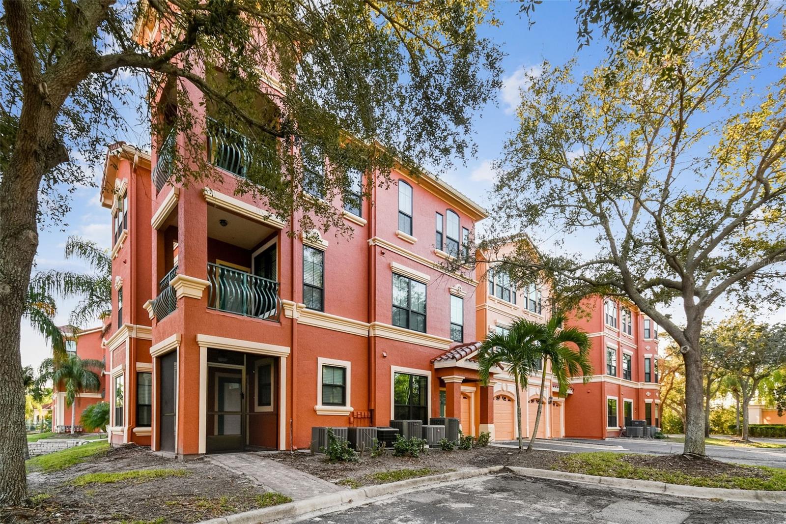 Welcome to Grand Bellagio Condo located in a Completely Renovated Building. This one of the largest condos in the entire community , two full stories, oversized 2 car garage with guest parking and corner water facing views. Unit comes along with PRIVATE DOCK and 16,000 lb dock lift. A true boaters dream.Enjoy this waterfront community offering water access and a 24-hour gate with guard on Old Tampa Bay. Your home offers you 3 bedrooms, 2.5 bath with the loft and two screened lanais one from the owner's suit and one downstairs where you can enjoy the Florida living. Kitchen offers new stainless steel appliances and gas range, granite counters, crown molding throughout the unit and tile throughout the first floor. Master suit offers soaking tub, oversized frameless shower with bench seating, custom tile work and lighting, walk in closet and full double vanities. Additional upgrades include NEWER HVAC, water heater, brand new Hurricane protected windows.The resort style amenities at the Grand Bellagio were recently updated with a geo-thermal heated pool and spa, furnishings and cabanas, 24-hour guard gated community entrance, trash valet, 24/7 fitness center, free use of kayaks, beach volleyball, playgrounds, car wash/vacuum stations, clubhouse & conference center and tennis.  Conveniently located adjacent US 19, you're just a 15 minute drive to downtown Tampa/St. Petersburg/the airport and the number one beach- Clearwater Beach. The building fully renovated and has brand new Roof, exteriors, windows. You are living in maintenance free community.