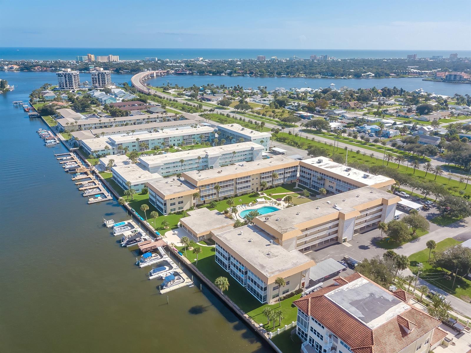 Your new modern waterfront completely remodeled slice of heaven awaits you here in this amazing condo. Walk to famous Flagler or stroll over to old school downtown canal street and grab a bite to eat. This all new interior condo offers captivating water views on this water front property. Nothing has been overlooked or spared. Custom cabinets kitchen, baths, Bamboo wood plank floors throughout. Impact windows, newer ac, updated electrical and plumbing. Newer stainless appliances including refrigerator. Clubhouse and pool, assigned (garage style covered parking) that is large enough to accomodate 2 cars. Unit also comes with 2 assigned storage lockers, bike storage rooms, woodshop room. Kayak and fish from the docks on property. Boat slips available upon wait list for use. Walk or ride your bike to Flagler avenue, canal street, or the beach. Enjoy monthly car shows, weekly farmers market, frequent art shows, wine walks, local 5k runs and so much more. All information is intended to be accurate but is not guaranteed. ;Water: City