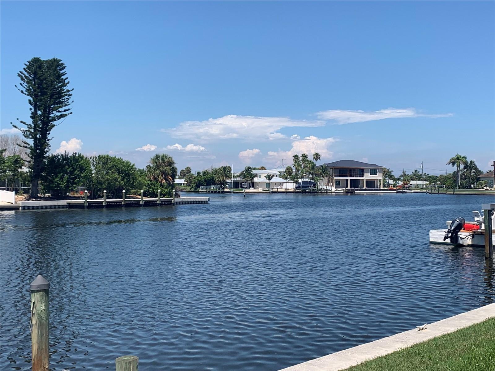 If your dream has been to live on the grand canal, here is your rare opportunity, for one of the largest lots!!! Build your dream home on this 11,400 sq ft property.  Lots this size on the grand canal are highly sought after and rarely available.  Elevate your home for grand views of Bimini Bay and glorious sunsets!!! This lot is sailboat water with no bridges to the gulf or intercoastal.  Walking distance to the beach, shops and trolley. Quick boat ride to Galati Marina to fuel your boat.  Zoning allows for 1 month rentals.  Don’t miss this great opportunity!!! Owner is licensed realtor.