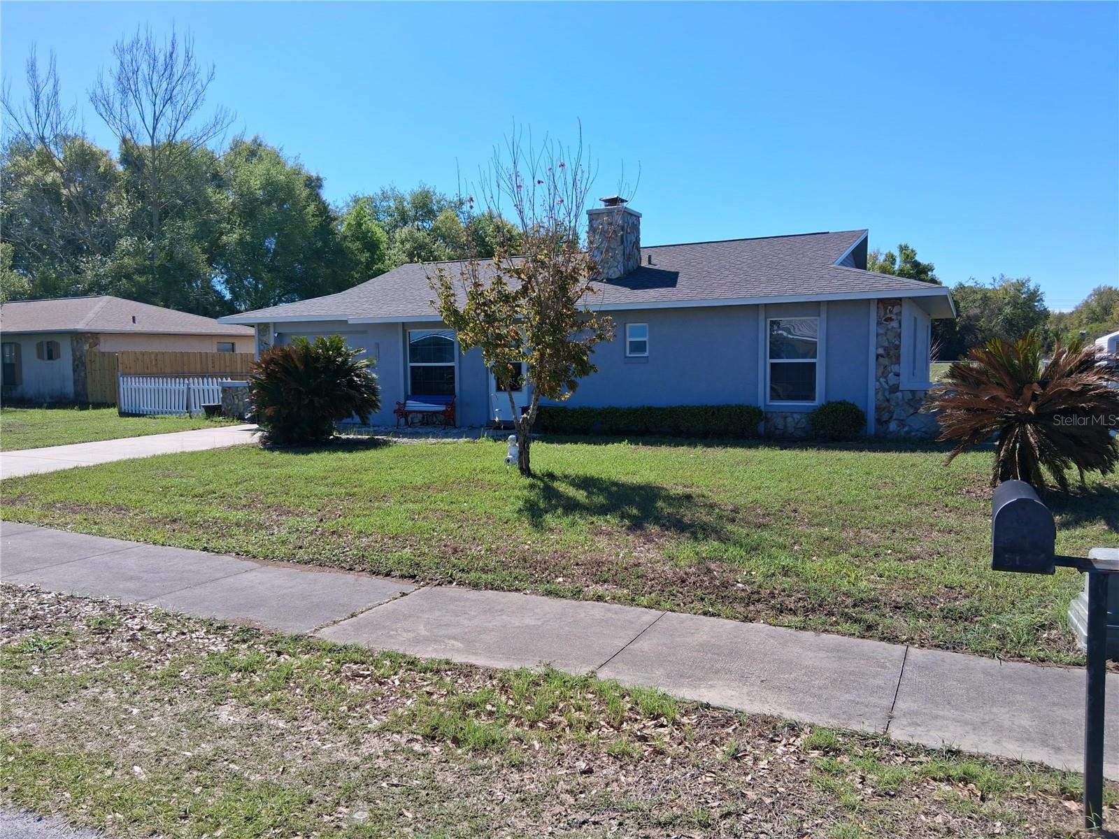 Very well maintained home on 1 streeted community. 2 bedrooms, 2 baths. Living room up front with fireplace, kitchen on the back. Eating space in kitchen .2 bedrooms, baths down the hall. Such a nice screened in back porch. Gazebo in the backyard, and large workshop also. Workshop has electric. Big fenced in  backyard.