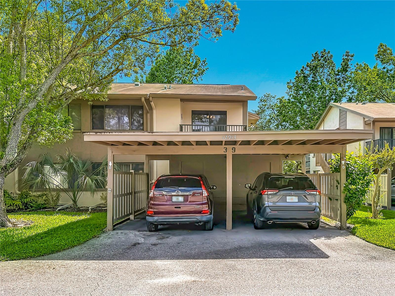 Welcome to your own slice of Florida paradise! This beautifully maintained 55+ second-floor end-unit condo is bright, airy, and move-in ready.

Natural light fills the home through numerous windows, a wonderful benefit of the desirable end-unit location. The thoughtfully designed floor plan feels open, comfortable, and inviting from the moment you enter.

Enjoy your morning coffee on the private kitchen patio while taking in peaceful surroundings and gentle Florida breezes. The kitchen includes all appliances, including a washer and dryer, plus a convenient pantry and laundry closet.

The dining room offers flexibility to fit your lifestyle. Use it as a dining space, home office, study, hobby room, or reading retreat. The spacious living room provides plenty of room to relax or entertain.

One of the highlights of this home is the screened porch, shaded by mature oak trees and cooled by refreshing breezes. From here, enjoy beautiful views of one of the fairways of the Beacon Woods Golf Course across the street, creating a peaceful & scenic backdrop. It's the perfect place to enjoy a quiet morning, an afternoon book, or an evening beverage while watching nature & golfers pass by.

The primary suite features an ensuite bath & walk-in closet, while the second bedroom is located on the opposite side of the condo, providing privacy for guests. 

Located within the beautiful Beacon Woods Golf Course community, residents enjoy tree-lined streets, mature landscaping, and sidewalks perfect for walking & birdwatching in this recognized bird sanctuary. The park-like setting creates a sense of tranquility that is increasingly hard to find.

This well-managed condominium association offers its own pool, hot tub, shuffleboard courts, and community center. The pool is conveniently located just across the parking lot from the unit, making daily swims and relaxing afternoons effortless.

Residents also enjoy access to the larger Beacon Woods community amenities, including a heated pool, lighted tennis and pickleball courts, basketball, bocce ball, fitness center, playground, and an active clubhouse featuring dances, cards, yoga, and seasonal events.

The monthly fee of just $445 covers exterior maintenance, water, sewer, trash, basic cable with internet, community amenities, and dues for the larger Beacon Woods community. Your only regular utility expense is electricity, making ownership both simple and affordable.

Love to travel? Lock the door and leave knowing exterior maintenance is handled for you. The association is known for strong management, completed improvements, and reserve funds for future maintenance, providing valuable peace of mind.

Just minutes from Hudson Beach and within easy driving distance of Fred Howard Park, Clearwater Beach, Honeymoon Island, Fort De Soto, shopping, dining, fishing, boating, cultural attractions, Tampa, and St. Petersburg, this location offers endless opportunities for recreation and enjoyment.

This is more than a condo—it's an opportunity to enjoy an active, carefree Florida lifestyle in a beautiful setting with exceptional amenities, friendly neighbors, and outstanding value. Whether you're looking for a year-round residence or a seasonal retreat, this home offers comfort, convenience, and the best of Florida living.

Furniture is available separately. All dimensions are approximate, and buyers should verify information important to them, including condominium rules and regulations.
