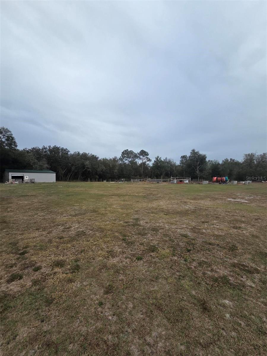 Discover the freedom and potential of this 5-acre parcel located at 35238 Manuel Street in Webster, Florida. Zoned Residential (R) and situated in Flood Zone X, this property offers an excellent opportunity for those looking to build, invest, or create a private retreat with space to spread out.

With 656 feet of frontage and dimensions of approximately 656 x 332, the land provides flexibility for a variety of uses. Utilities are already in place, including electricity available, water (well), septic, and high-speed internet capability, making future development more convenient. The property is fully fenced with barbed and wood fencing and features paved road access, offering both privacy and accessibility.

No HOA, no CDD, and AG exemption eligible, giving buyers added flexibility and potential tax advantages. Located in Hernando County with easy access to major roadways, this property offers the perfect balance of rural living while remaining within reach of nearby towns and amenities.

Whether you’re dreaming of building your custom home, establishing a small farm, or securing land as a long-term investment, this property delivers space, utility access, and opportunity—all in one package.

Survey available. Property sold As-Is.
Schedule your showing today and imagine what’s possible—this could be yours.