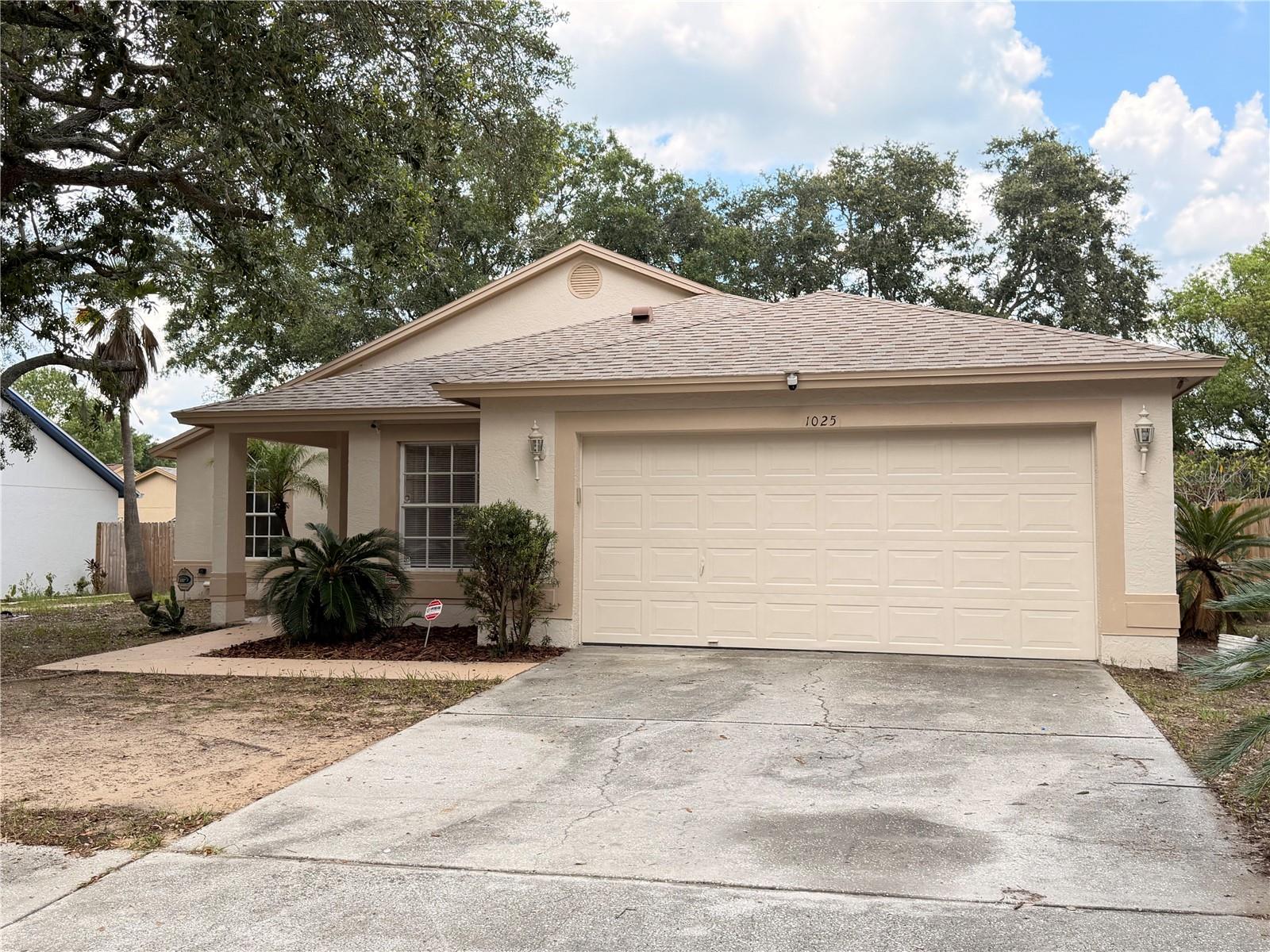 NO HOA OR CDD FEES! MOVE-IN READY AND FULL OF POTENTIAL!

Welcome to this charming 3-bedroom, 2-bathroom, 2-car garage home nestled in an established neighborhood with no HOA or CDD fees. Freshly painted interior and exterior, this move-in-ready residence provides the perfect opportunity to add your personal style and make it truly your own.

The inviting open-concept living and dining areas flow seamlessly into a functional galley kitchen featuring a cozy breakfast nook—ideal for everyday living and casual entertaining. A thoughtfully designed split-bedroom floor plan offers both privacy and maximum functionality, ensuring every square foot is well utilized. Kitchen has brand new stainless steel refrigerator, a new range to cook those secret family recipes. Property has brand new flooring throughout.

Large windows and a sliding glass door fill the home with natural light while creating a seamless connection to the outdoor living spaces. Enjoy Florida living year-round from the screened lanai or relax on the open-air patio overlooking the fully fenced backyard—perfect for entertaining, pets, play, or creating lasting memories with family and friends.

Conveniently located with quick access to I-75 and I-4, this home offers an easy commute while maintaining the charm and tranquility of a well-established community.

Whether you're a first-time homebuyer, downsizing, or looking for an investment opportunity, this home is ready for its next chapter.

Welcome Home!