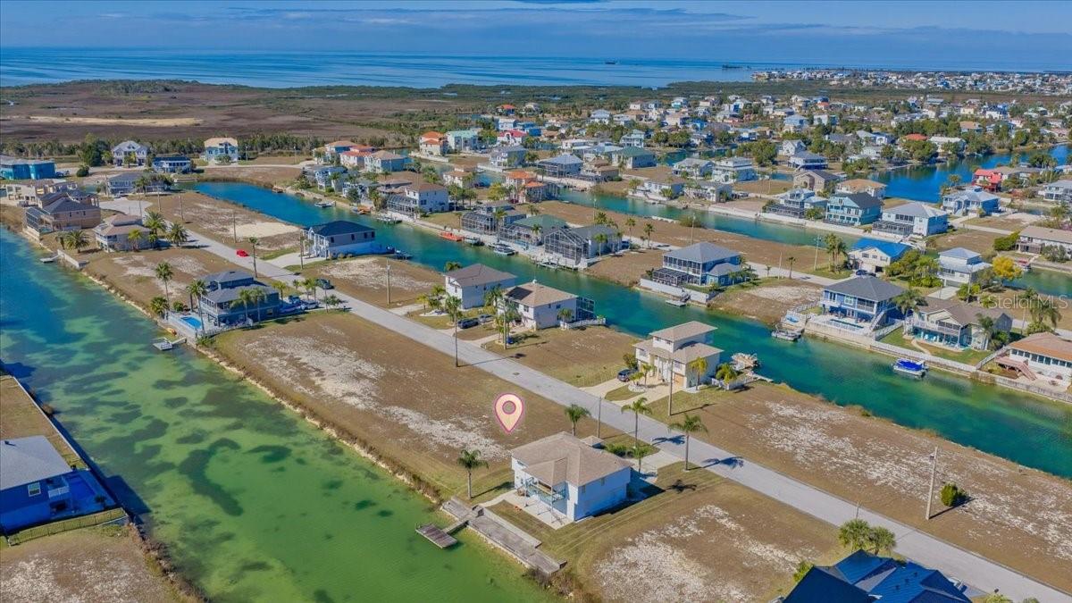 Come Build your dream home in Hernando Beach South! Build your dream coastal home in the highly sought-after Deed Restricted Community of Hernando Beach South. This 7,500 SF (75x100) waterfront homesite is READY FOR DEVELOPMENT and includes a SURVEY, GEOTECH REPORT, and CONSTRUCTION PLANS — saving you time and money as you prepare to build.
The low $330 annual HOA fee includes lawn maintenance until construction begins and access to the community boat ramp. Enjoy the benefits of a well-maintained waterfront neighborhood with NO SHORT-TERM RENTALS ALLOWED (3 month minimum rentals), helping preserve the peaceful coastal atmosphere homeowners love.
Located in a flood zone, future homes must be elevated. Zoned R1B for SINGLE-FAMILY HOMES ONLY (no mobile homes permitted). Water, sewer, and electric are available at the street and will need to be connected to the future residence. NO BUILD TIME REQUIREMENT — build now, later, or hold as an investment opportunity. RV living is not permitted.
Residents enjoy Gulf access through the community boat lift or community boat ramp, making it easy to enjoy boating, fishing, kayaking, and the Florida waterfront lifestyle. Contact the listing agent for a video explaining how the community boat lift operates.
Hernando Beach is a charming coastal community along Florida’s Gulf Coast known for its laid-back lifestyle, scenic waterways, and excellent boating access. Nearby attractions include Weeki Wachee Springs State Park, waterfront dining, marinas, golf courses, shopping, and entertainment. Whether you're looking to build a full-time residence, vacation retreat, or future investment property, this lot offers an incredible opportunity to own in one of Hernando County’s most desirable waterfront communities.
Lot lines shown in aerial photos are approximate. Property is located just past 4000 Cobia Drive on the left side of the roadway. No for sale sign on property. Land financing options may be available. No seawall is currently present on the property. Schedule your showing today and start planning your Florida coastal dream home!