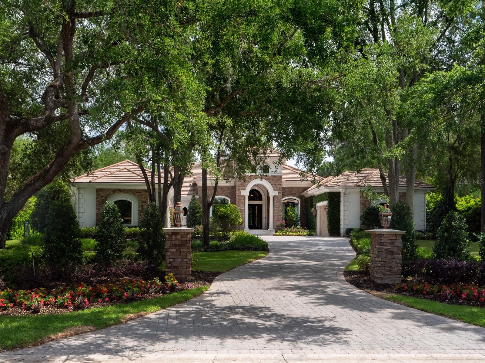 If you are seeking a luxury home that is better than "new construction", with unparalleled finishes, set on one of the most private lots with mature landscaping, and is move in ready, then look no further. This fabulous property recently underwent an extensive two year renovation, bringing it to a high level of sophistication and artful design, that is extremely rare to find, including new construction! It is located on the 18th Fairway in the Masters Section of Golden Ocala Golf & Country Club. Jump on your golf cart, and motor next door to the World Equestrian Center to experience world class horse shows as well fine dining, pub fare, and a variety of other year-round entertainment and events! The owners spared no expense in the transformation of this home, and was planned in great detail by award winning designers and the finest craftsmen. Through the double doors is a grand entrance to the living room with a full wall of windows for an unobscured view of the waterfall, pool, and meticulous landscaping & fairway in the distance. The private primary suite is spacious & layered in luxury with the finest fixtures and finishings. There are also three additional en-suite guest bedrooms designed to the same level of sophistication. The handsome chef's kitchen features high end appliances & fixtures, a double island, rich wood cabinetry, built-in ovens, two dishwashers, built-in coffee machine, wine fridge, stand-alone built-in ice machine, and a large pantry. Adjoining the kitchen is a warm and comfortable family room; two walls of retracting glass doors open fully to the pool and outdoor living area. You will feel as if you just landed in a tropical paradise at a five-star resort; the landscaping, mature trees & hedges provide beauty, ambience, and a level of extreme privacy on a very spacious lot. Words can only modestly describe the beauty and tasteful grandeur of this fantastic move-in ready Golden Ocala home.