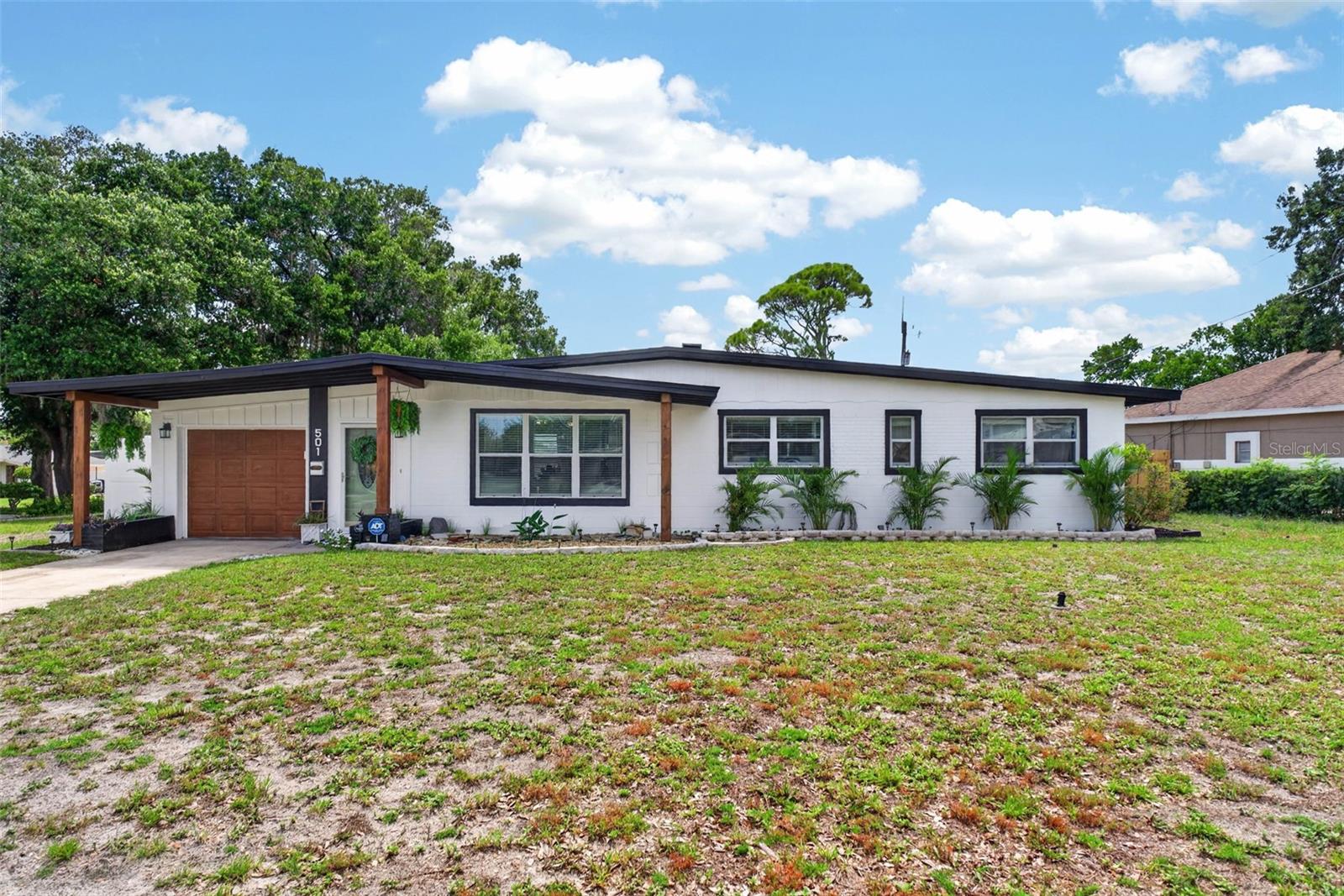 Welcome home to this beautifully updated 3-bedroom, 1.5-bath residence in the heart of Azalea Park! The seller will install a BRAND-NEW ROOF prior to closing, with the buyer having the opportunity to select the shingle color! The kitchen features elegant granite countertops, newer stainless steel appliances, an updated stainless steel kitchen sink, and ample cabinet space for storage. Throughout the home, you'll find luxury vinyl plank flooring, updated light fixtures, ceiling fans, and select windows with new blinds. The primary suite includes a half bathroom and built-in storage. 

Enjoy peace of mind with numerous recent updates, including an HVAC system replaced in September 2019, partial ductwork replacement, new attic insulation (2026), toilets updated last year, bathtub reglazing (2026), a termite bond already in place, freshly painted exterior, refreshed landscaping, new fencing installed, updated garage springs (2024), and a garage door motor installed in 2019 with smart MyQ app control. The dedicated laundry room has also been updated and includes a convenient utility sink.

Step outside to an expansive, fully fenced backyard featuring a new fire pit and storage shed, perfect for entertaining, gardening, pets, or simply enjoying Florida's beautiful weather while the front yard features a small pond with tadpoles inside! The fence also includes a large access gate to the backyard for trailer or boat parking. Conveniently located near shopping, dining, major highways, Orlando International Airport, and downtown Orlando, this well-maintained home combines comfort, functionality, and exceptional value. Schedule your private showing today!