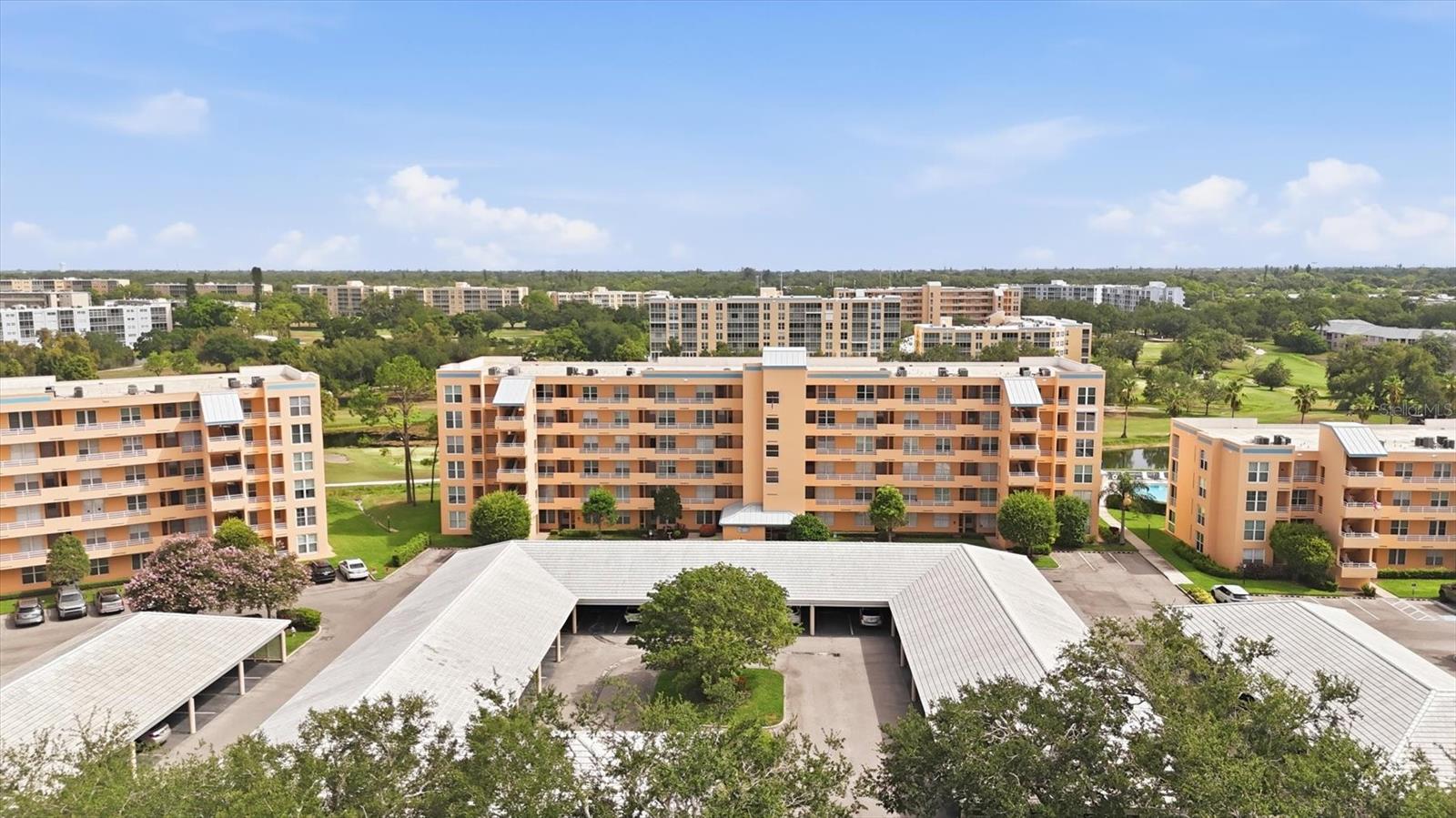 Move-in ready in The Greens at Pinebrook. This  2-bedroom, 2-bath condo features peaceful views of the Ironwood golf course and water views, as well as breathtaking sunsets from the spacious enclosed lanai. This light-filled residence features an open, inviting floor plan with Travertine Tile, crown molding, 20-inch travertine tile in the main living areas and Luxury Vinyl Flooring in the Bedrooms.
The oversized eat-in kitchen is beautifully appointed with 48-inch wood cabinetry, granite countertops, abundant storage, and Stainless Steel Appliances, including a double oven. Both bathrooms have been tastefully remodeled with modern vessel sink vanities.  The Condo also has a large Laundry Room with a Full-Size Washer and Dryer.
Enjoy maintenance-free living with covered assigned parking and an exceptional array of resort-style amenities. Residents of The Greens have access to a private heated pool, as well as the remodeled clubhouse featuring a resort-style pool and spa, grilling area, fitness center, pickleball, tennis courts, billiards, table tennis, library, workshop, art and dance studios, and a full calendar of social activities.
Ideally located just minutes from shopping, restaurants, grocery stores, pharmacies, medical facilities, and everyday conveniences, and approximately 6 miles from the Gulf beaches. Whether you're looking for a year-round residence or a seasonal retreat this exceptional condo offers the perfect combination of location, lifestyle, and value.