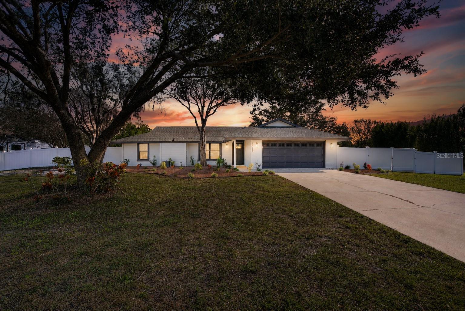 One acre, corner lot! Welcome to the highly sought-after location of Racimo Ranches community, where you’ll enjoy the perfect blend of country charm and modern convenience with NO HOA and NO DEED RESTRICTIONS. Situated on an open one-acre corner lot with multiple access points, this beautifully remodeled 3-bedroom, 2-bath home features a FRESHLY PAINTED exterior, mature landscaping, and excellent curb appeal. Inside, the bright and spacious living room features luxury vinyl plank flooring throughout. At the same time, the UPDATED KITCHEN boasts shaker-style cabinetry, quartz countertops, a subway tile backsplash, LED lighting, stainless steel appliances, and a cozy dining area. Just off the dining space is a versatile bonus flex room ideal for a home office, den, or playroom that overlooks the backyard. Step outside to enjoy Florida living on the back deck with plenty of room for seating and grilling, perfect for entertaining. The desirable split-bedroom floor plan provides a spacious primary suite with an en suite bath featuring a walk-in shower and a large closet, while two additional bedrooms share a bright second bathroom with a relaxing jacuzzi tub. Additional highlights include a two-car garage, a detached shed, and plenty of room to BUILD IN-LAW SUITE, park your boat or motorhome, and enjoy the FREEDOM of acreage living. Conveniently located, you can ride your golf cart to restaurants and Publix, and you’re less than 3 miles from I-75 and only 6 miles from University Town Center. This move-in-ready home offers exceptional UPGRADES and peace of mind, including a BRAND NEW ROOF (2025), A/C replacement (2022), water softener system (2022), iron and sulfur blocker (2022), well pump (2024), lift station replacement (2022), drain field replacement (2022), a FULL INTERIOR RENOVATION in 2022 with added flex room, stainless steel appliances (2022), water heater (2022), and washer and dryer (2024). If you're interested in living in freedom, give us a call today to chat further!
